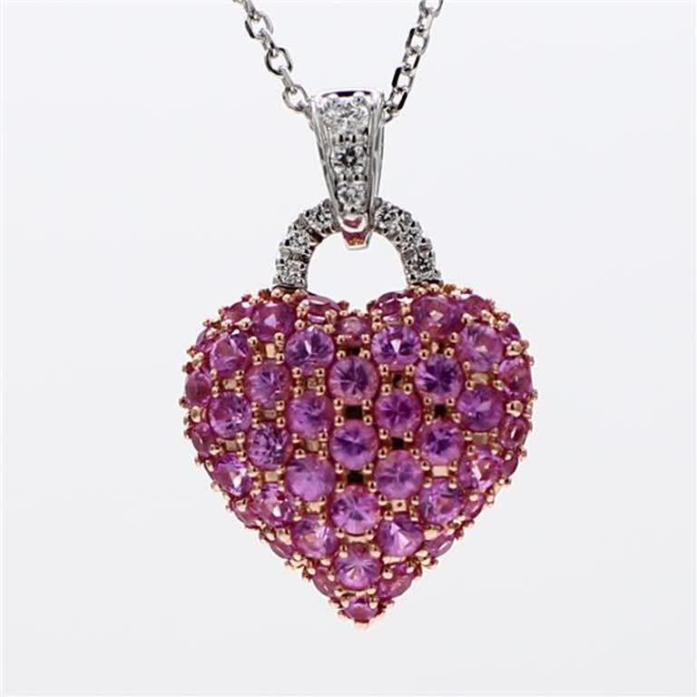 Round pink sapphire and white diamond heart shape pendant. This  pendant is designed to be in an intriguing setting. Can be used as a drop pendant or in addition to your collection of jewels.

Total Weight: 1.62cts

Length x Width: 22.0 x