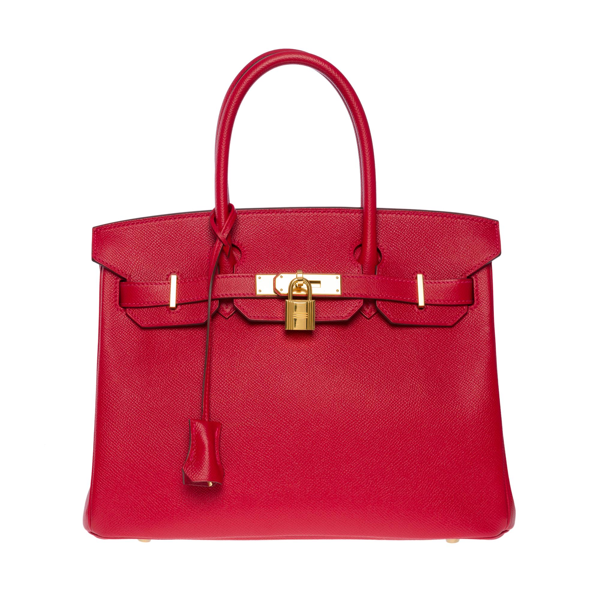 Exceptional Hermes Birkin 30 handbag in Epsom Red Casaque leather, gold plated metal hardware, double red leather handle for a hand-held

Flap closure
Red leather lining, one zippered pocket, one patch pocket
Signature: 