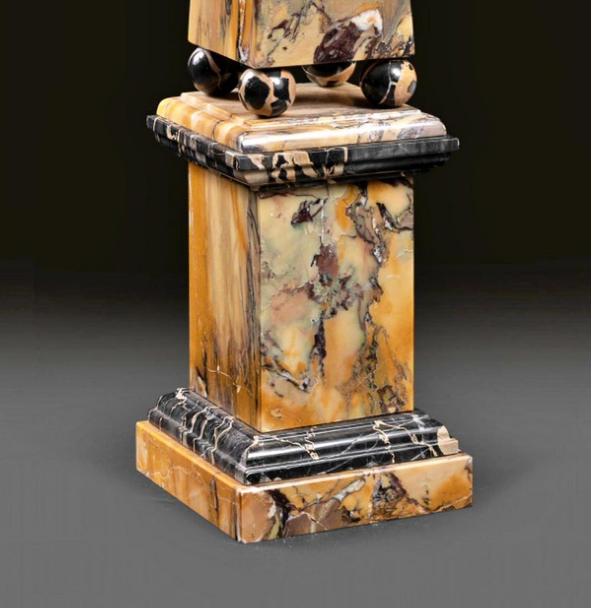 Obelisk model in yellow siena marble, 19th century.
With feet in small spheres and finishes at the base in portoro marble.
Measurements cm 81x13cm
Perfect condition.