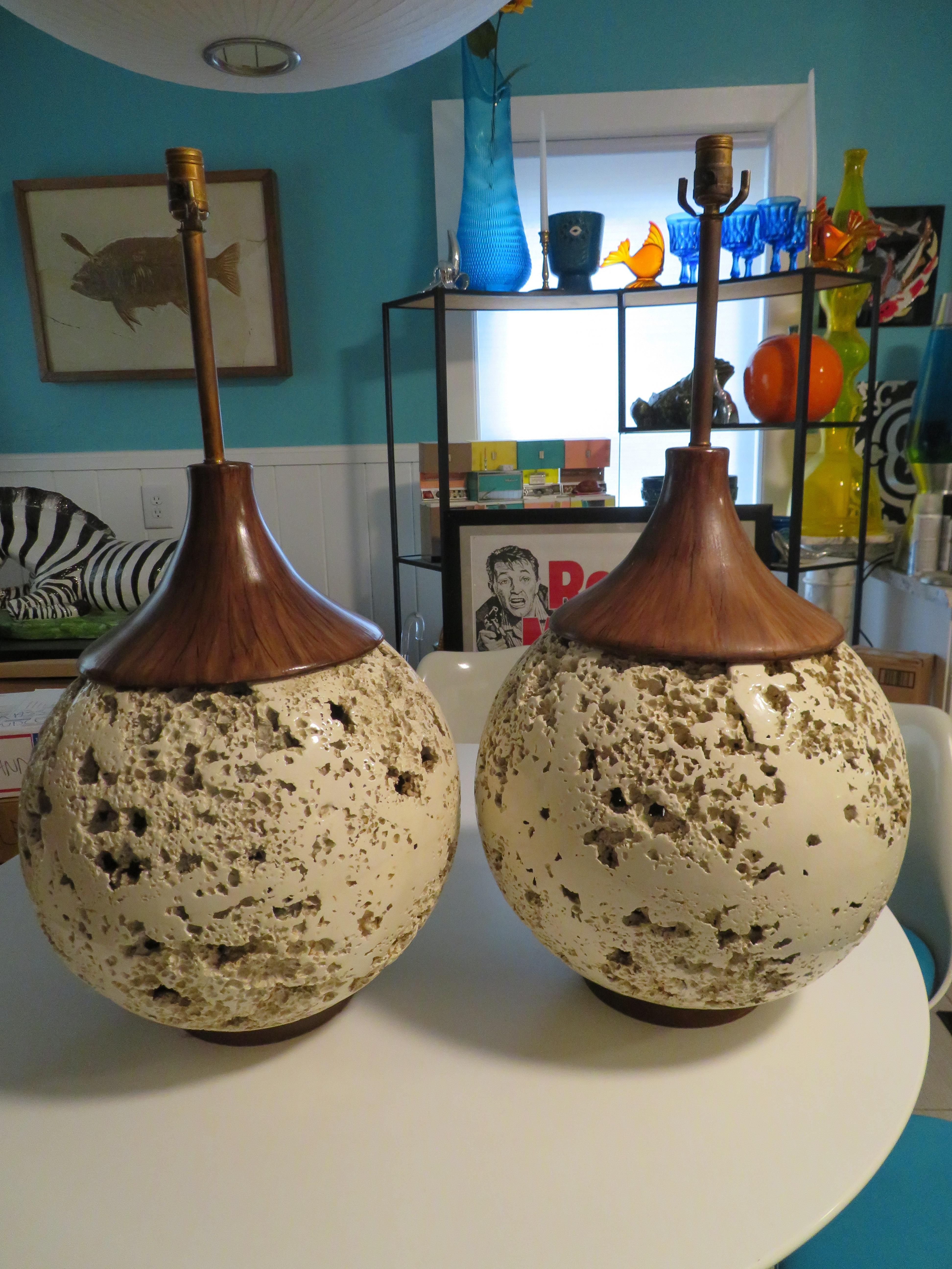Amazing pair of super jumbo faux travertine orb lamps. These lamps are huge and measure a whopping 57