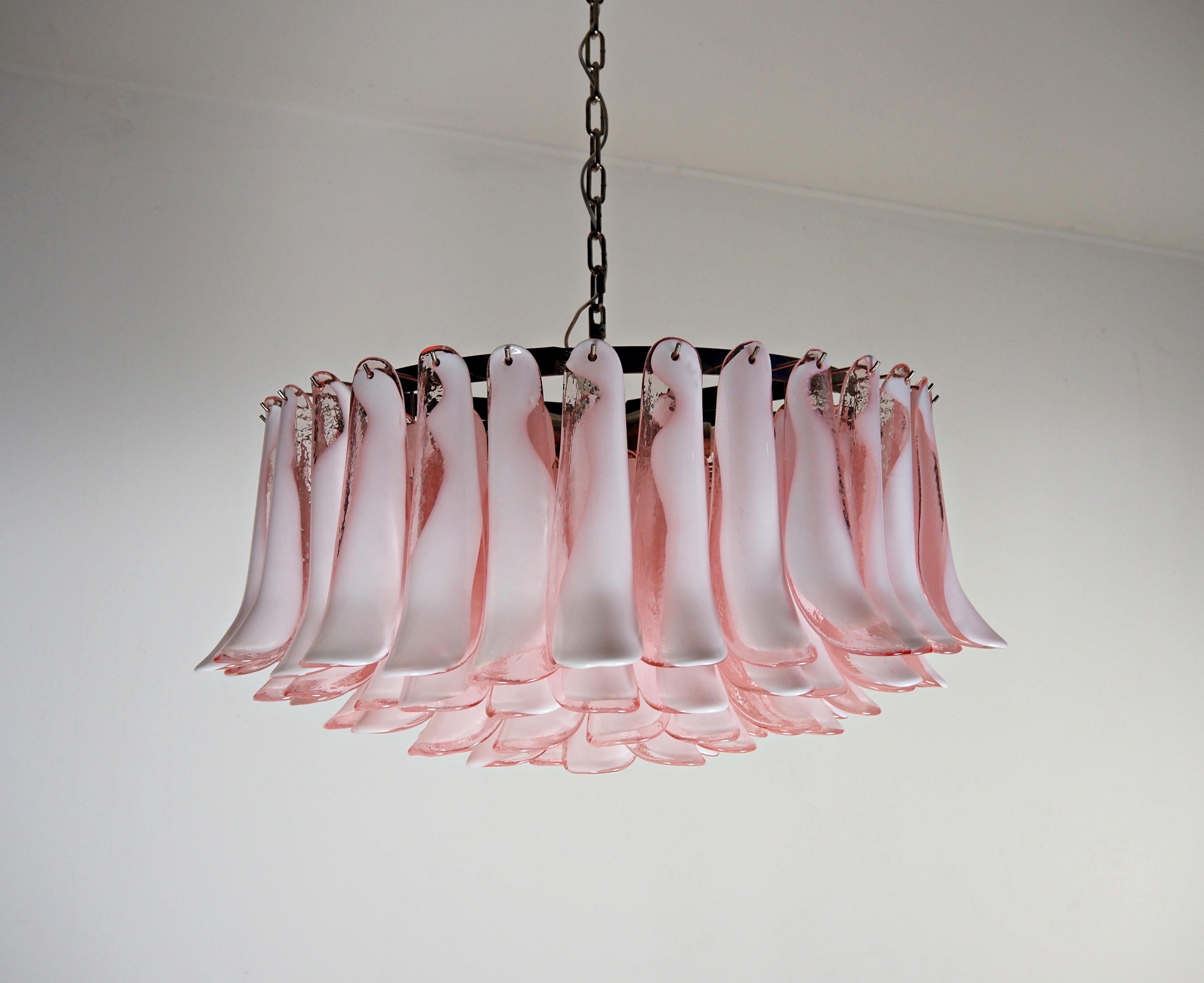 Pair Italian vintage chandeliers in Murano glass and nickel plated metal structure. The armor polished nickel supports 101 glass petals (pink and white “lattimo”) that give a very elegant look. Can be used as a chandelier with chain, or as a ceiling