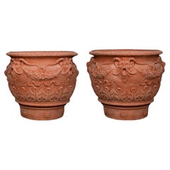 Incredibile coppia di vasi decorati con fauni in terracotta Impruneta fine XX secolo