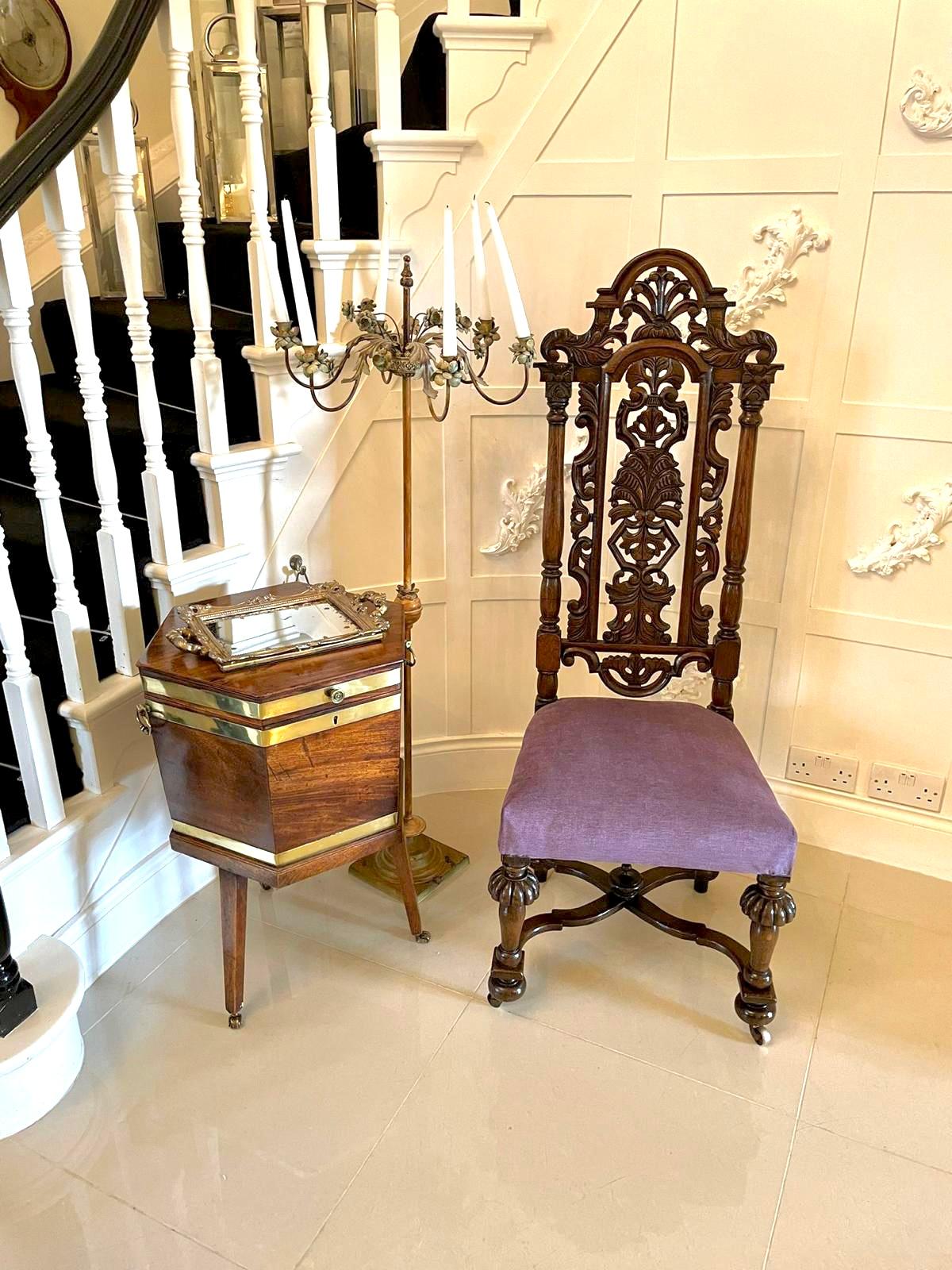 Amazing quality antique Victorian carved oak side chair having a quality carved shaped top above an amazing carved back with scrolls and leaves supported by shaped turned columns. The seat is a newly reupholstered seat in a quality fabric standing