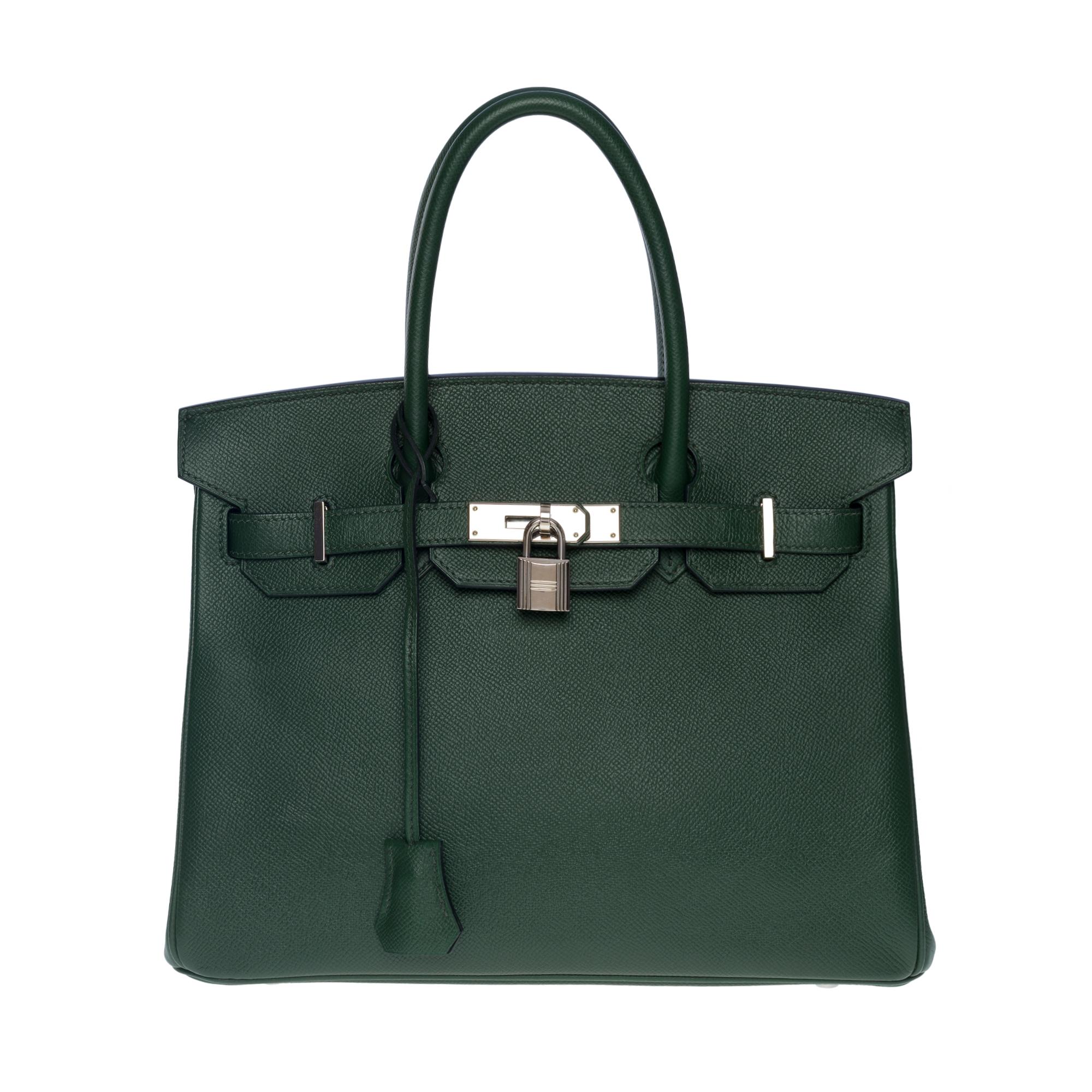 Exceptional & Rare Hermes Birkin 30 in Vert Anglais Epsom leather, palladium silver metal hardware, double green leather handle allowing a hand carry
Flap closure
Green leather lining, one zippered pocket, one patch pocket
Signature: 