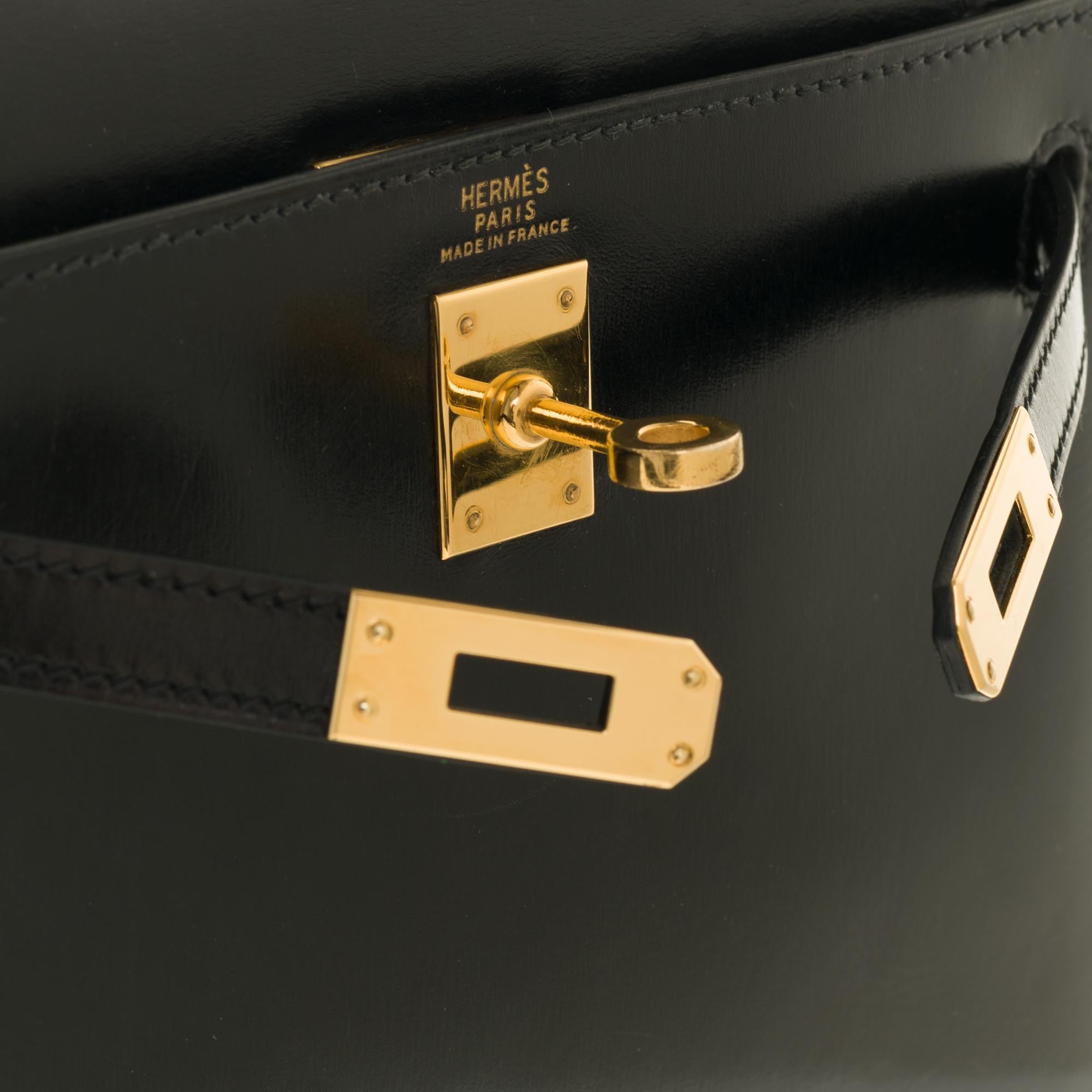 Women's or Men's Amazing & Rare Hermès Mini Kelly 20cm double strap in black box calfskin and GHW