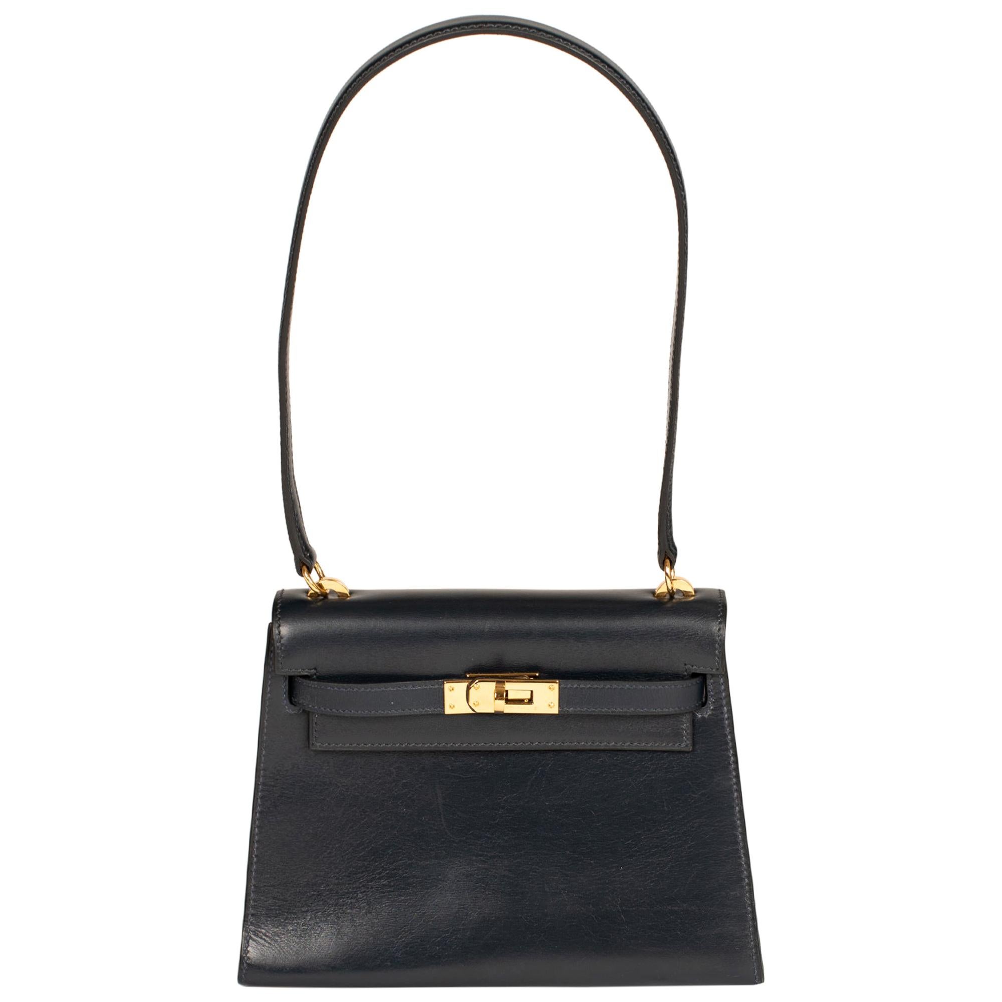 Amazing & Rare Hermès Mini Kelly 20cm in blue navy calfskin and gold hardware