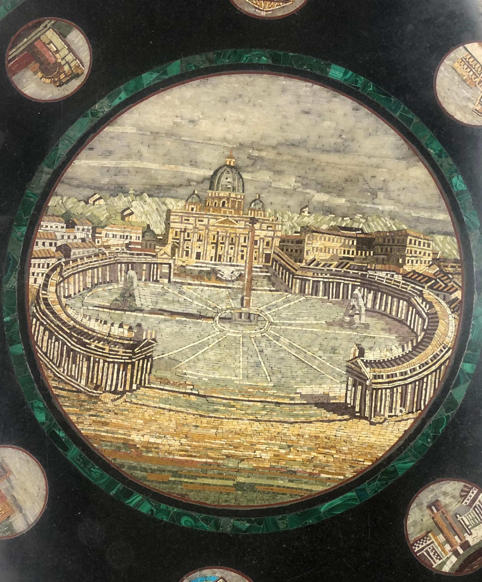 Amazing 19th century very high quality scenic micro mosaic table from Italy with hand carved figural legs. Large mosaic center medallion with 8 smaller medallions encircling the table. Notice the malachite border around the outside plus another full