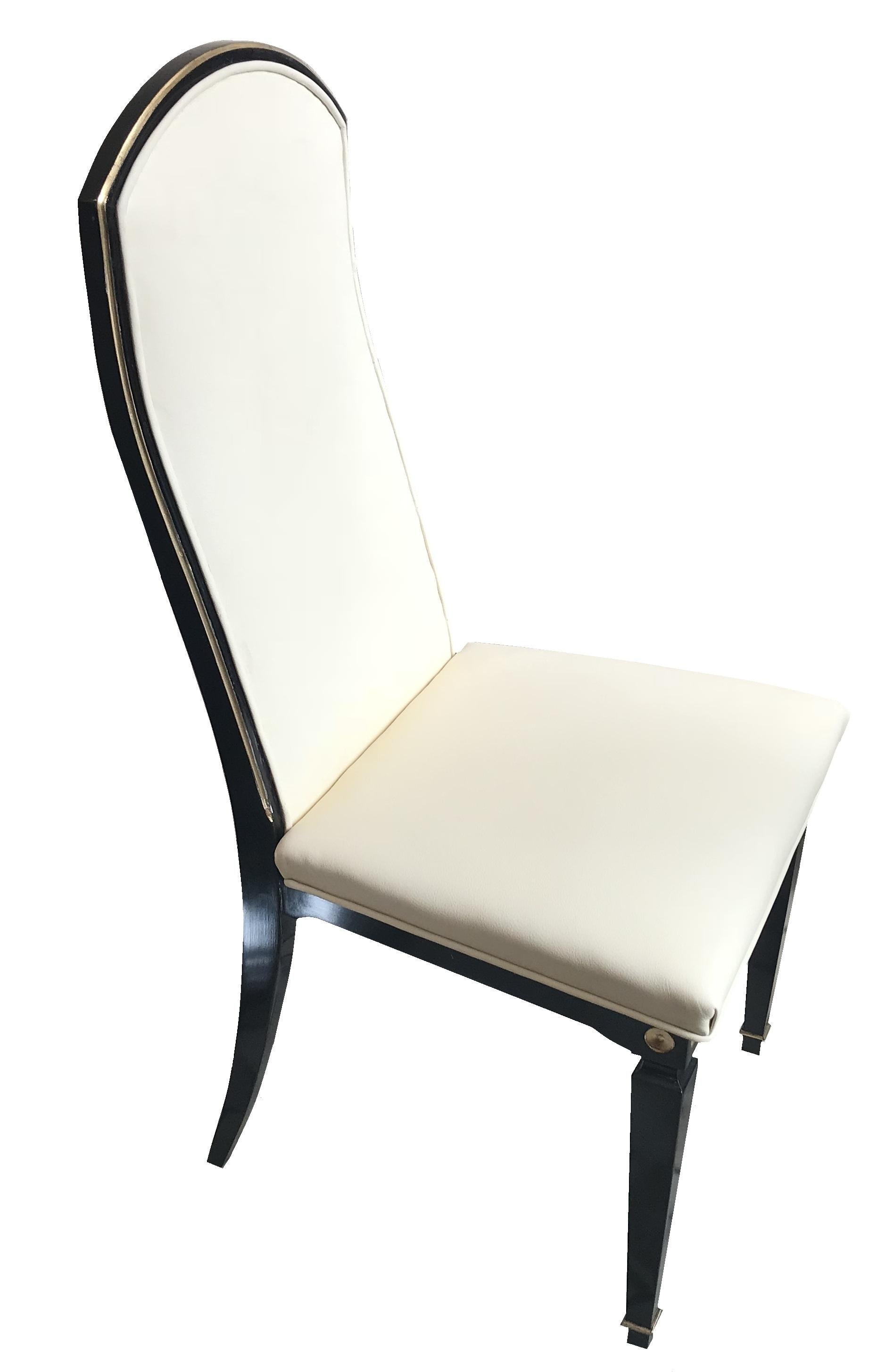 Luxury 12 Art Deco chairs in leather and wood.

Year 1930
Country: French
Materials : wood and leather
Finish: polyurethanic lacquer
Elegant and sophisticated 12 chairs.
You want to live in the golden years, these are the chairs your project