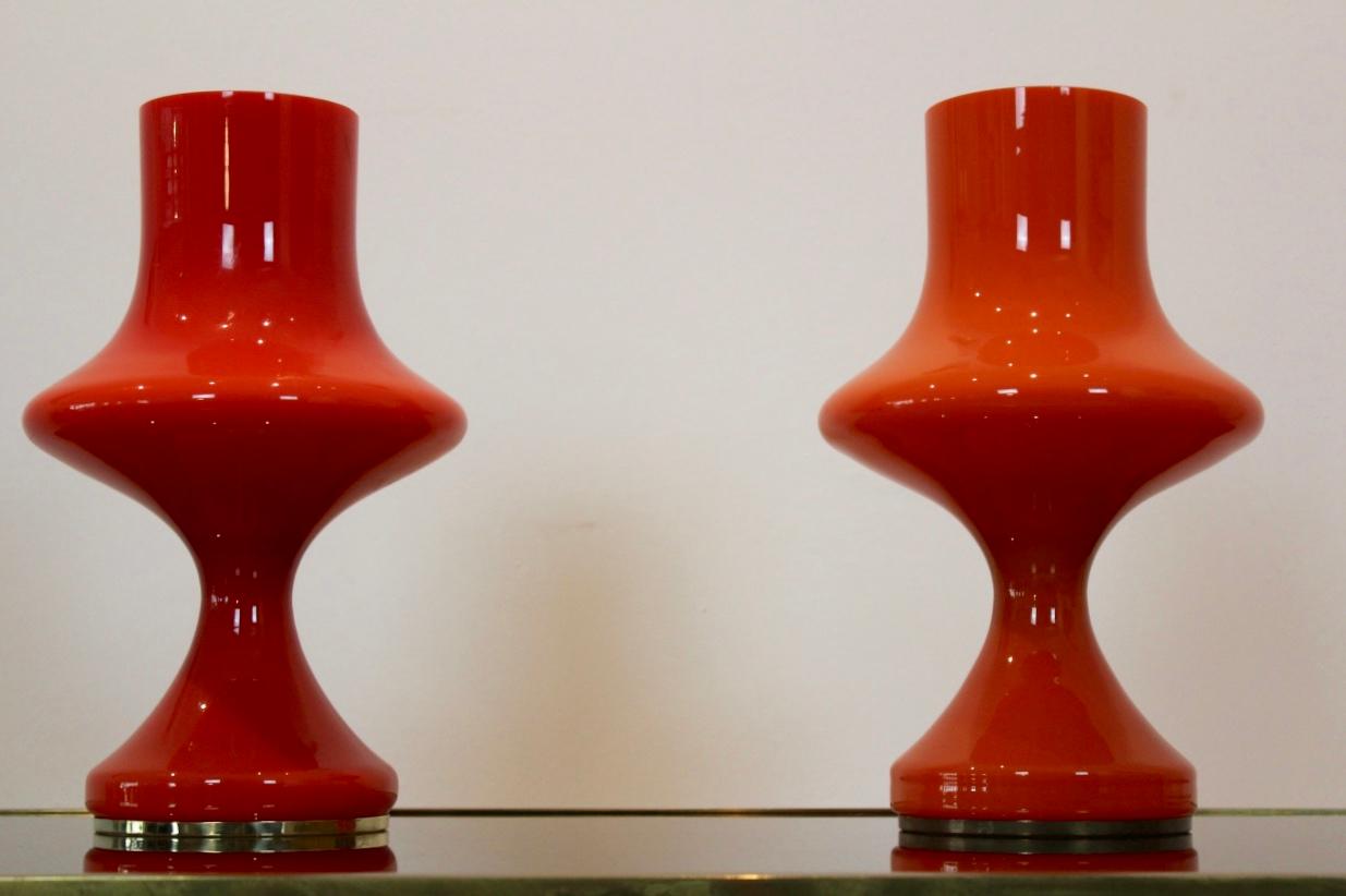 Beautiful set of orange opaline glass table lamps, produced by OPP Jihlava in the former Czechoslovakia in the 1960s. Designed by Štepán Tabery. The lamps feature a small brass-plated metal frame at the bottom. In excellent condition. With beautiful