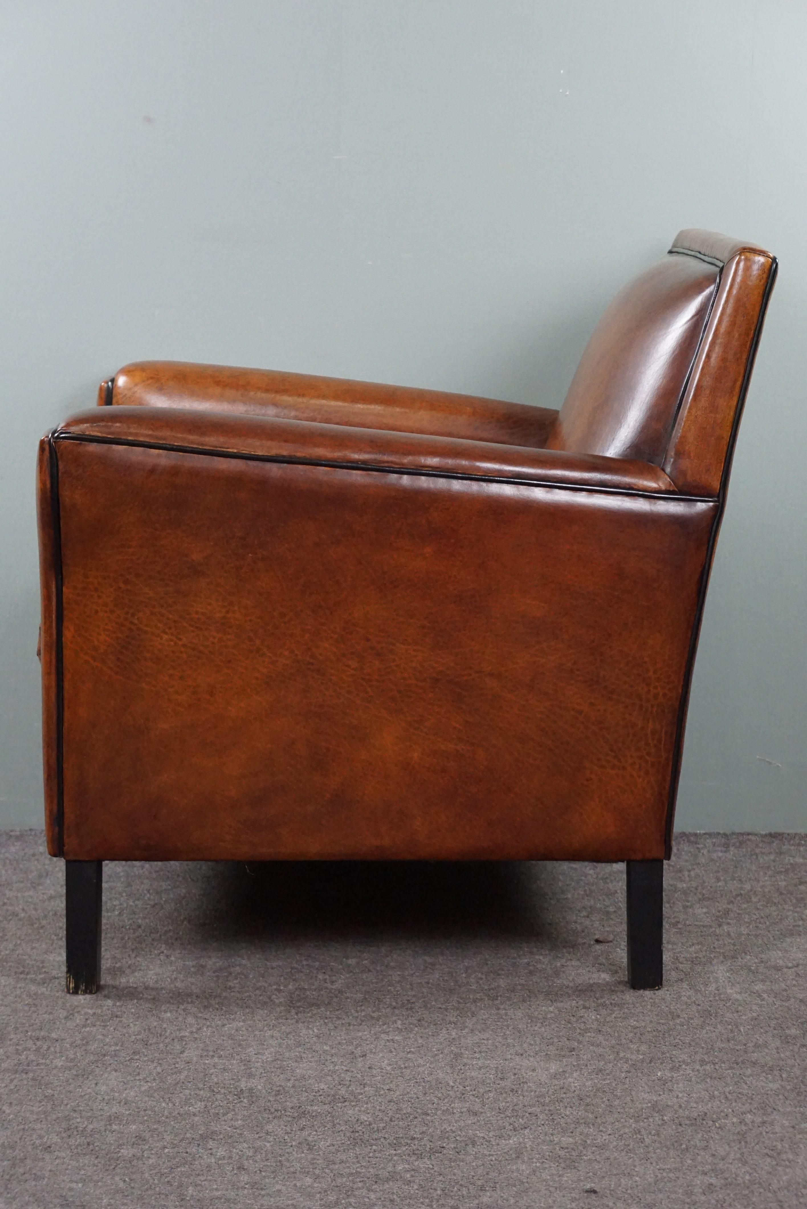 Late 20th Century Amazing sheep leather armchair in Art Deco style with warm colors For Sale