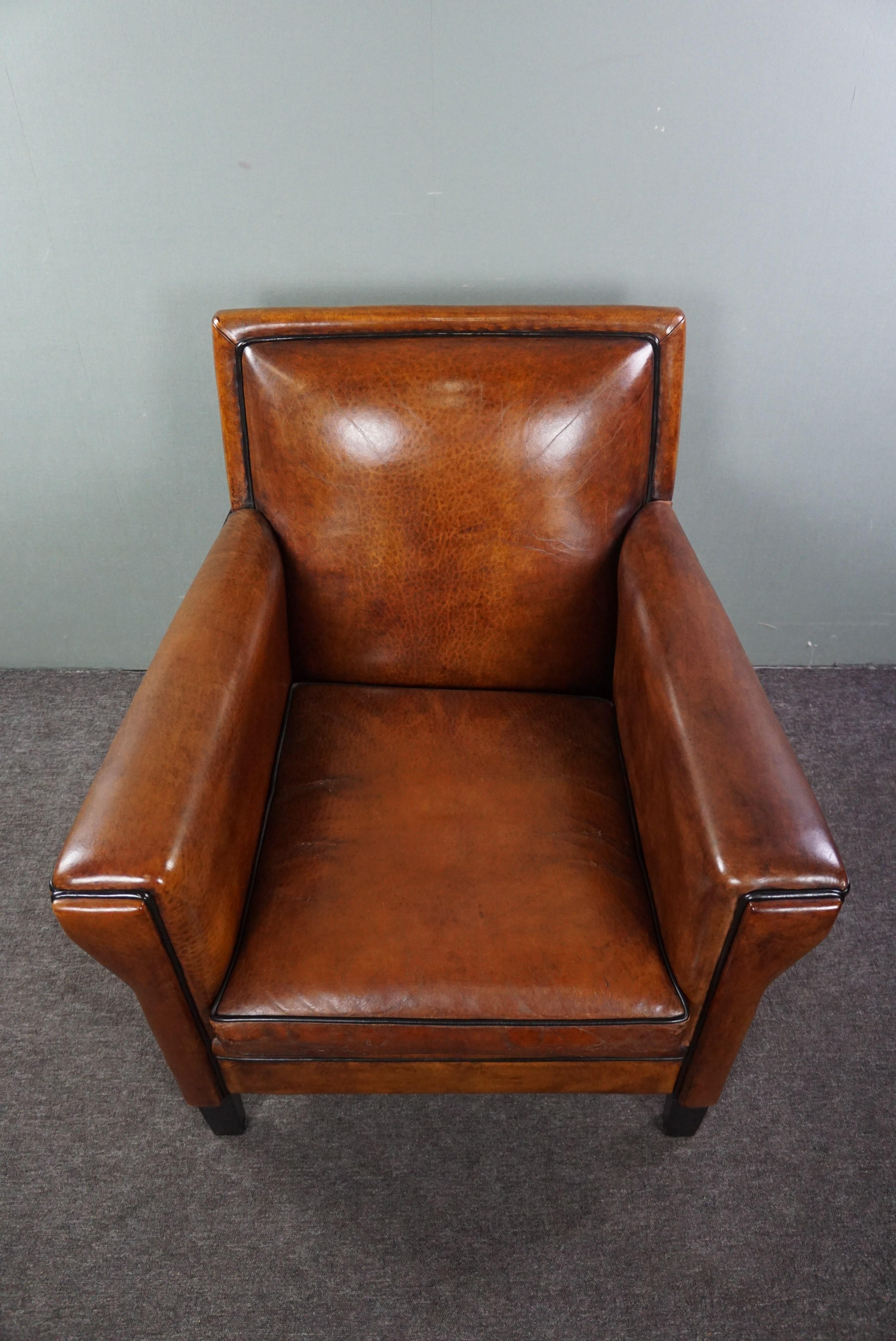 Leather Amazing sheep leather armchair in Art Deco style with warm colors For Sale