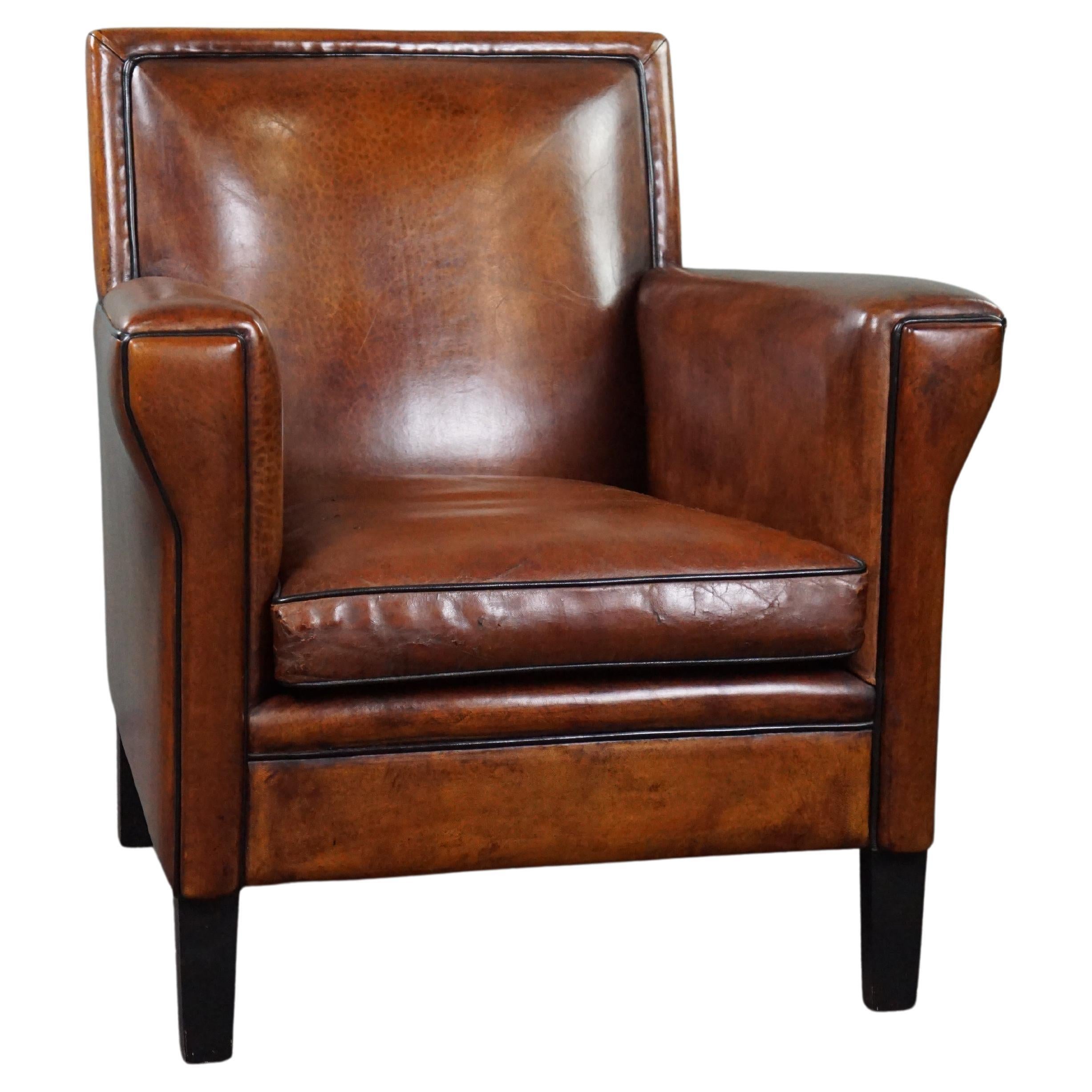 Amazing sheep leather armchair in Art Deco style with warm colors For Sale