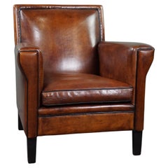 Vintage Amazing sheep leather armchair in Art Deco style with warm colors