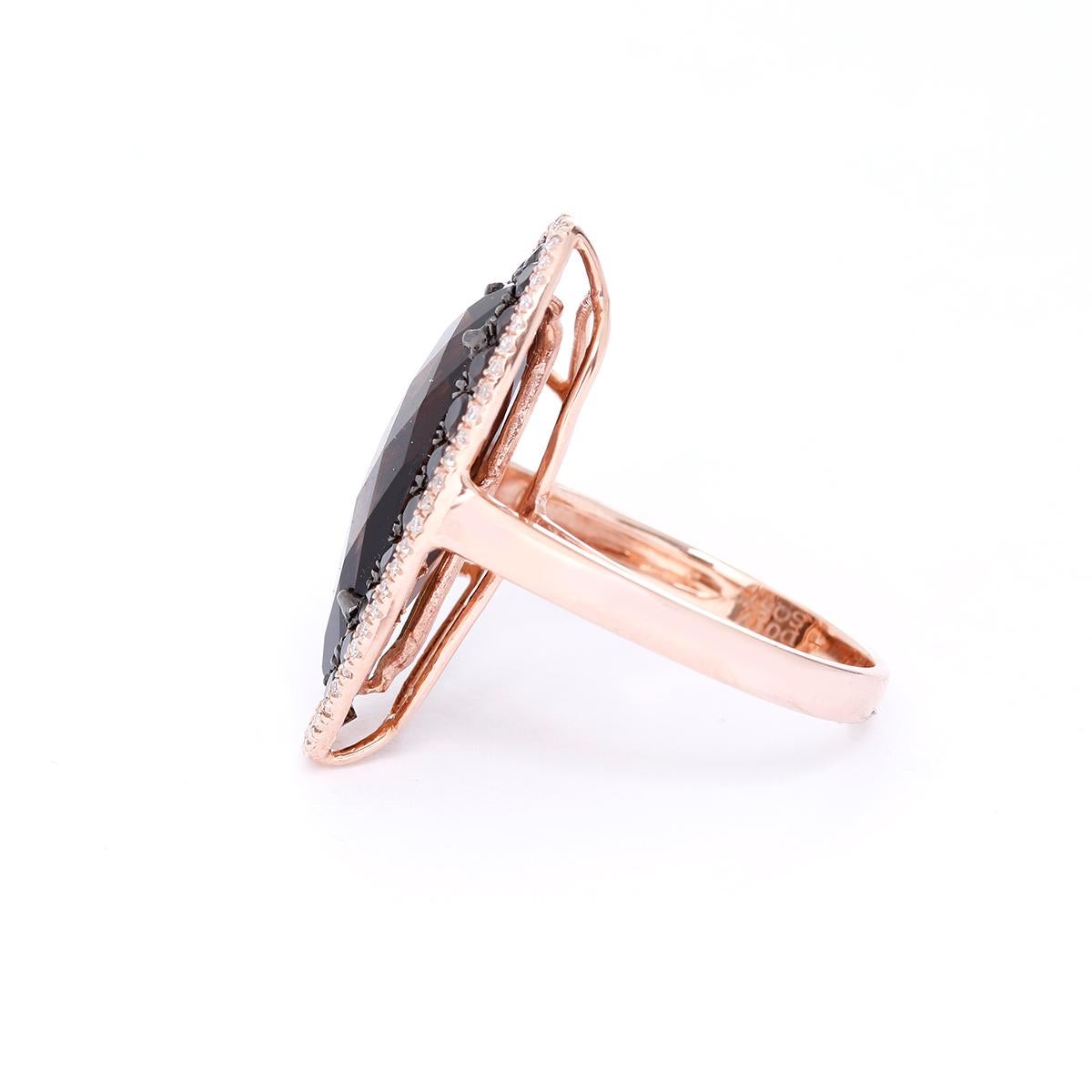 This amazing ring has 0.17 carats of  diamonds, 0.75 carats of smoky quartz ,and 1 piece fancy smoky quartz set in 14k rose gold. Ring measures apx. 5/8-inch in width at the widest and apx. 1-inch in length at the longest. 

Total weight is 6.2