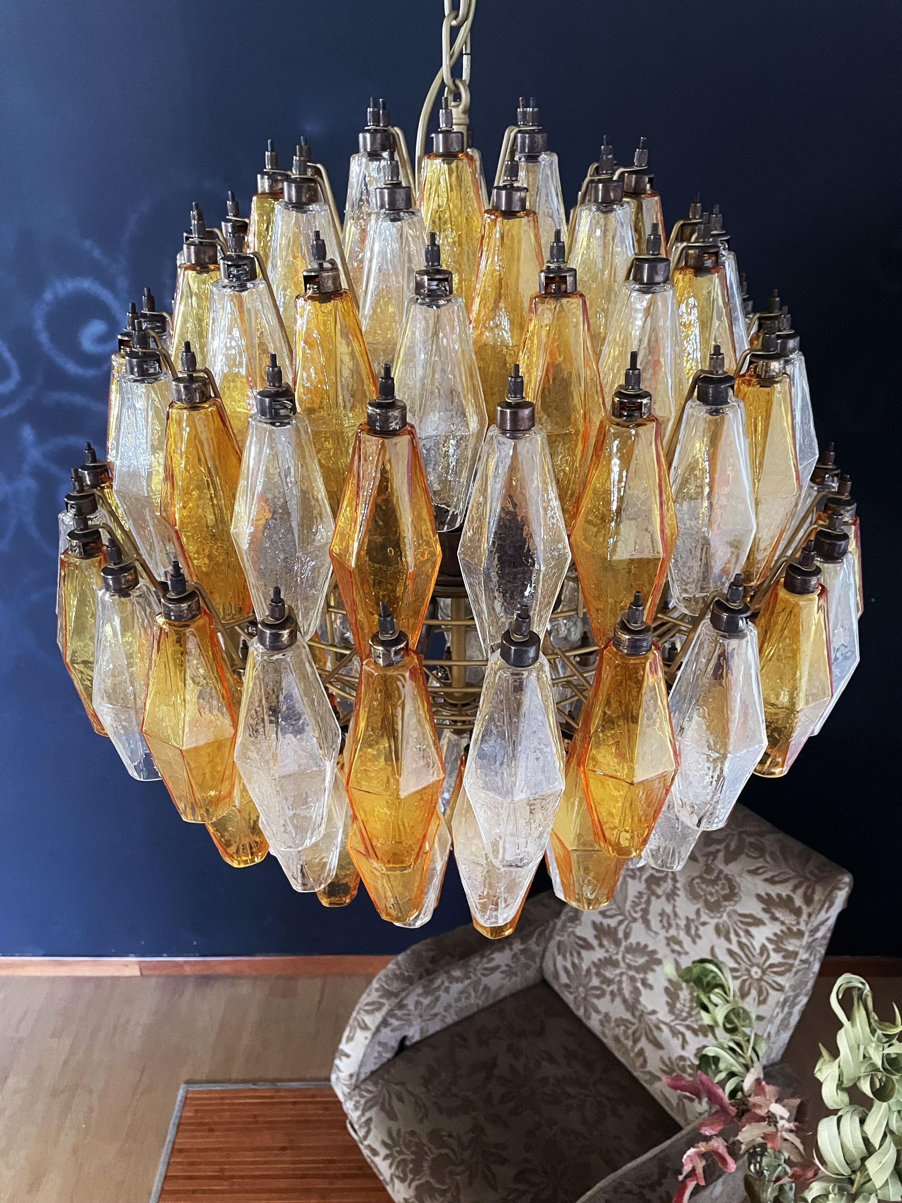 Elegant Italian pendant light made from 140 amber and trasparent Murano glasses 