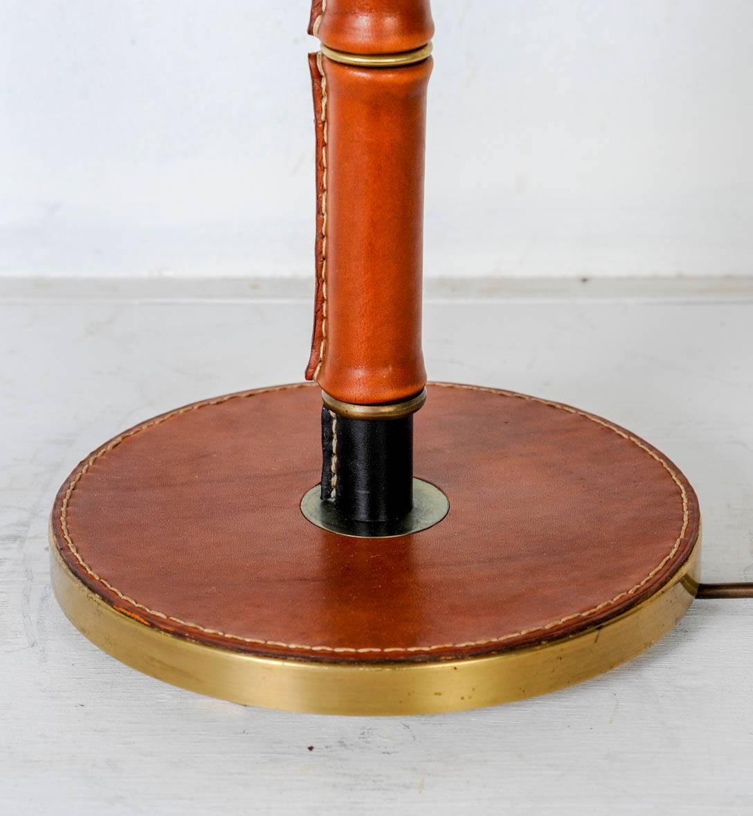 Stitched leather lamp by Jacques Adnet
Perfect condition
No shade provided
Dimensions given without shade.