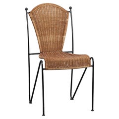 Amazing vintage design chair by Frederick Weinberg with a cast iron frame