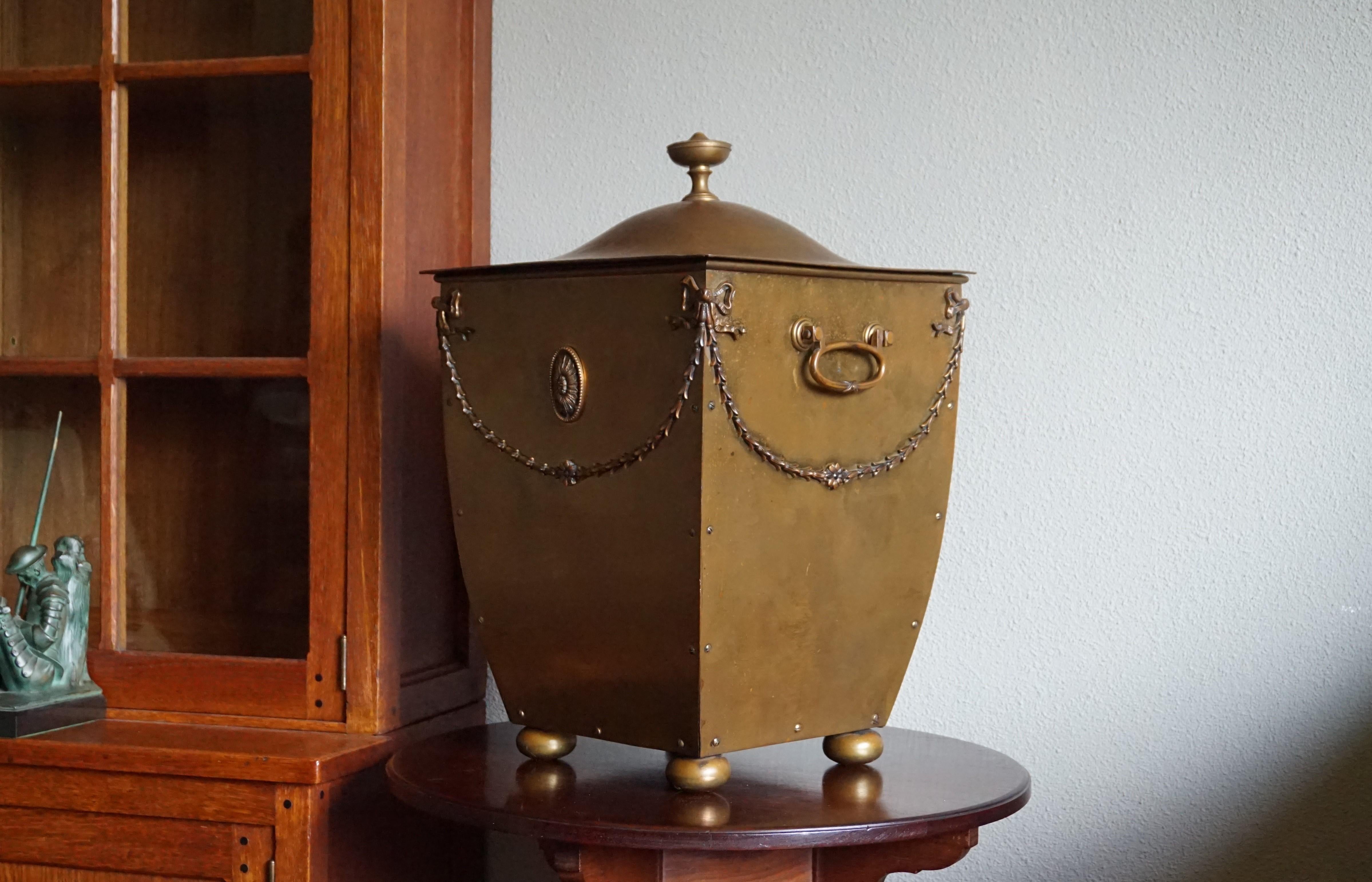 Exceptional workmanship bucket for fireplace decoration or otherwise.

Exceptional is the only word that comes to mind when looking at the design, the quality of the workmanship, the originality of this antique and the condition after more than one