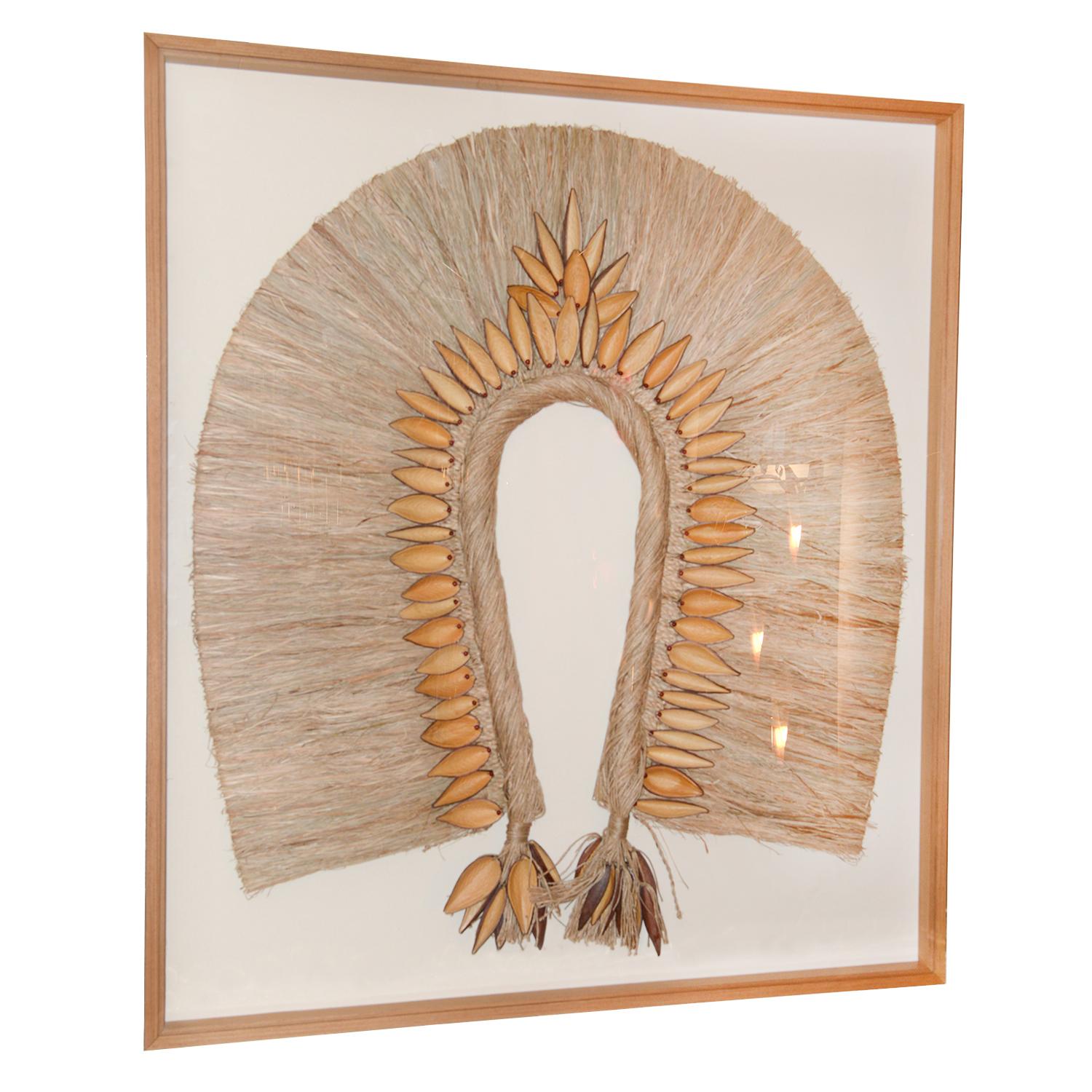 Wall Decoration Amazon Headdress traditional headdress of an 
aboriginal tribe from the Amazon made up of strands of natural 
straw, and dehydrated canoihna husks, husks arranged by hand 
and straws intertwined by hand. Frame in solid Tauari,