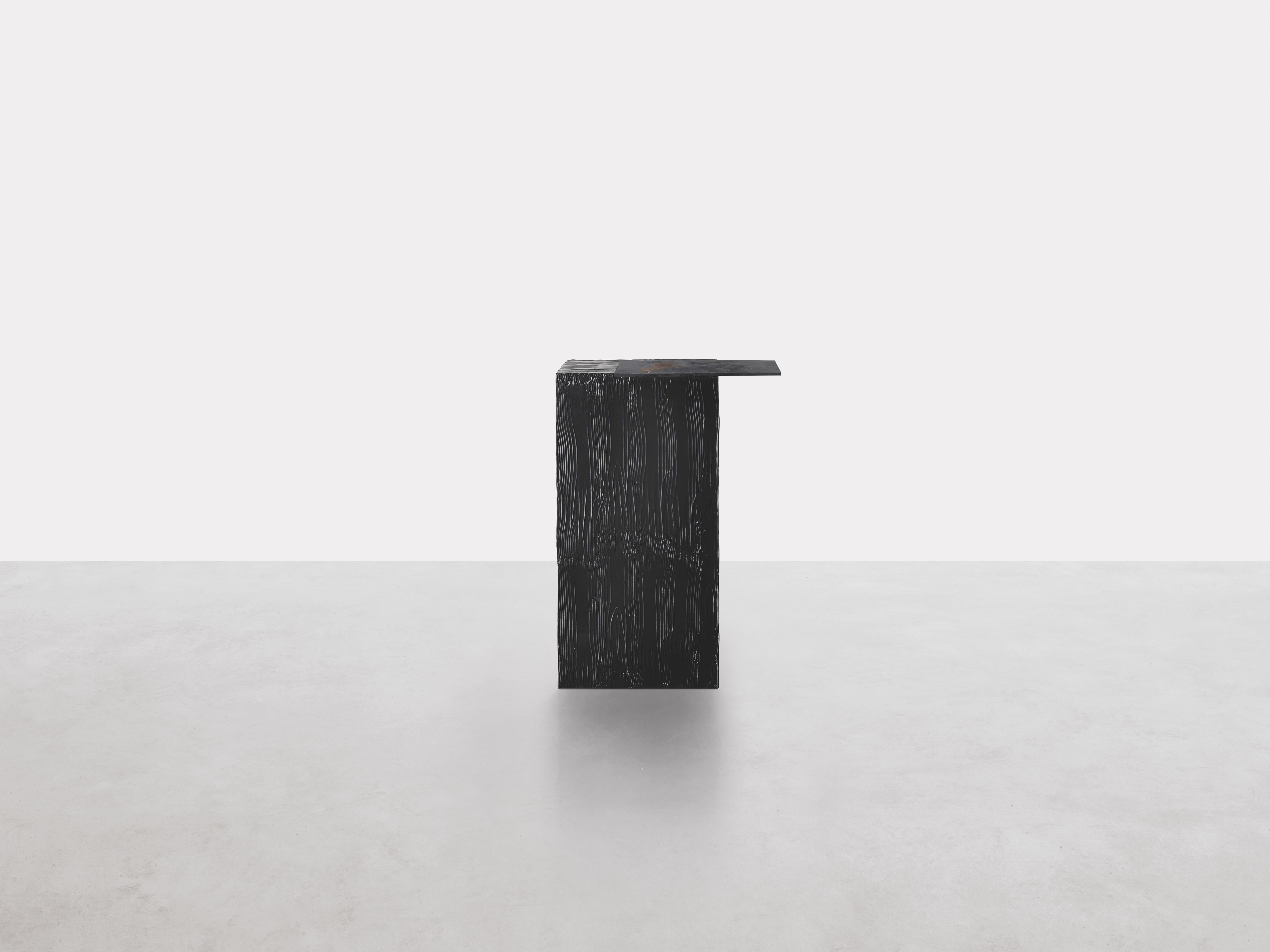Amazonia Occasional Table by Somaschini
Dimensions: W 36 x D 36 x H 60 cm
Materials: S47 Mdf structure in Black 3D Wood effect resin, with soft touch finish. Iron top with with Pure metal finish in Bronze Zinc mix. S48 Mdf structure in Black 3D Wood