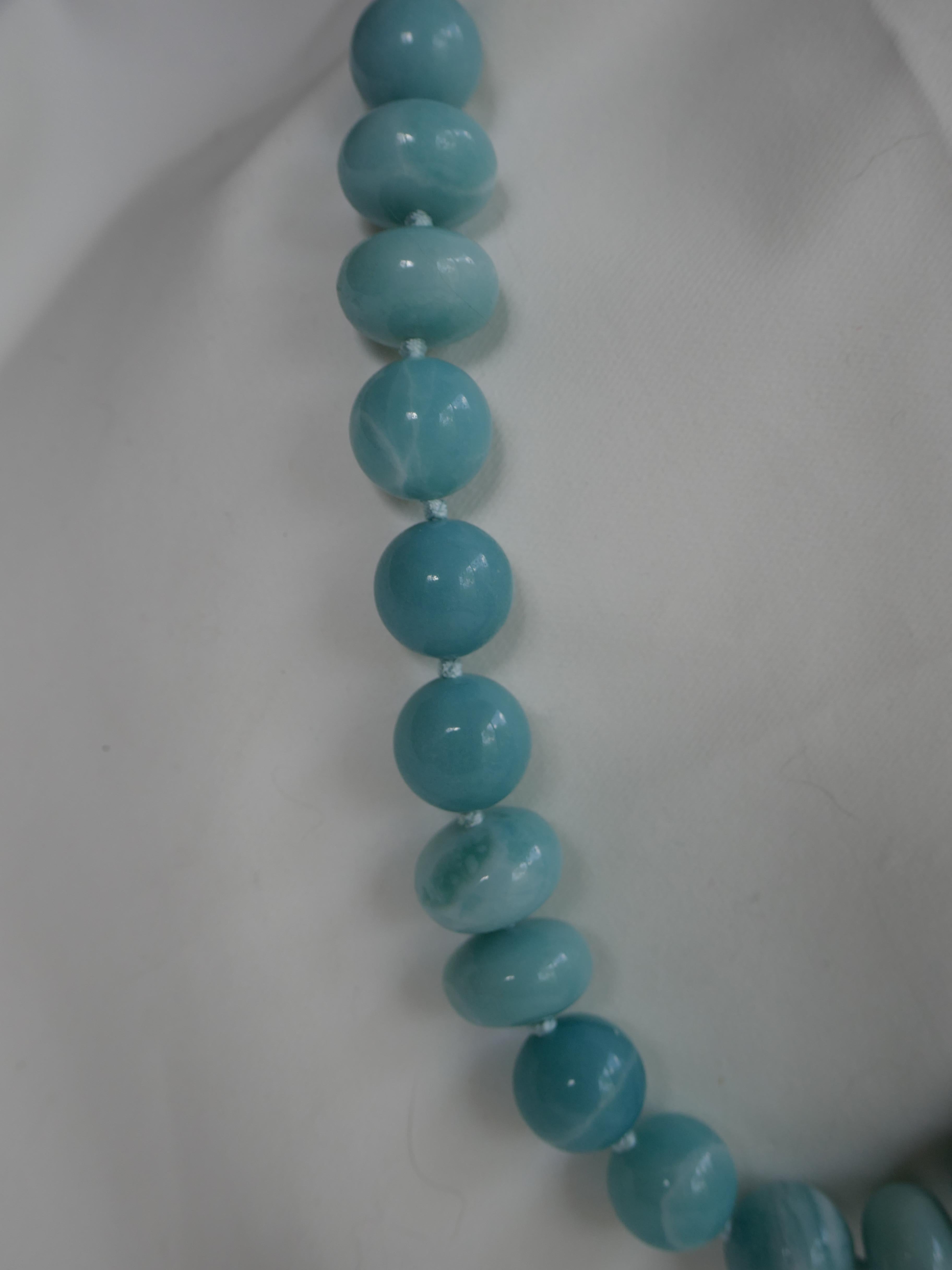 A beautiful necklace all around. This single strand amazonite necklace combines 14 mm amazonite and 16 mm amazonite roundels. The color of the amazonite is beautiful and the necklace looks amazing on. Amazonite is turquoise like in color and thus a