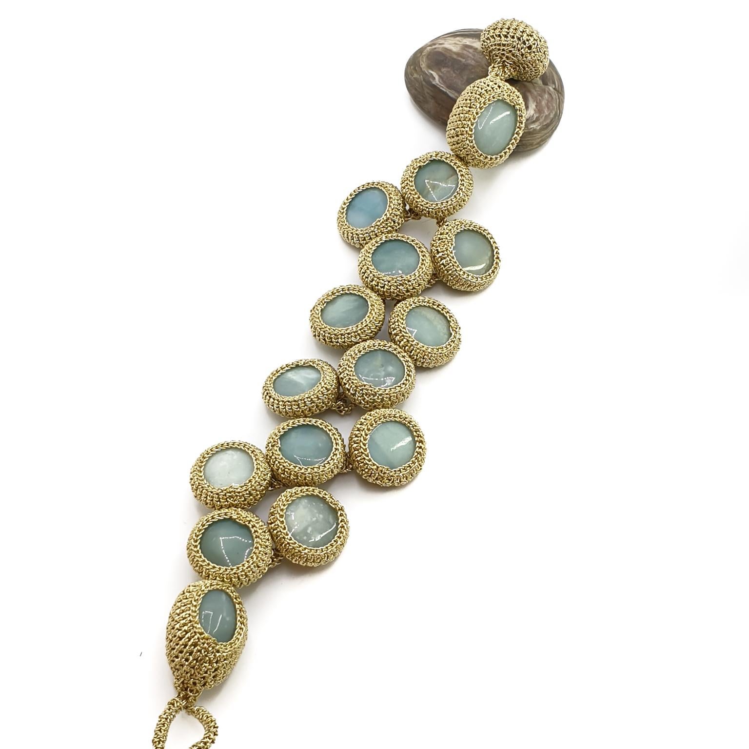 This is a One of a Kind crochet Amazonite stones bracelet. Each stone is crochet separately and then crochet together to create this beautiful bracelet.  The stones sizes range between 16mm round stones to 20mm rectangular shaped stones at the ends