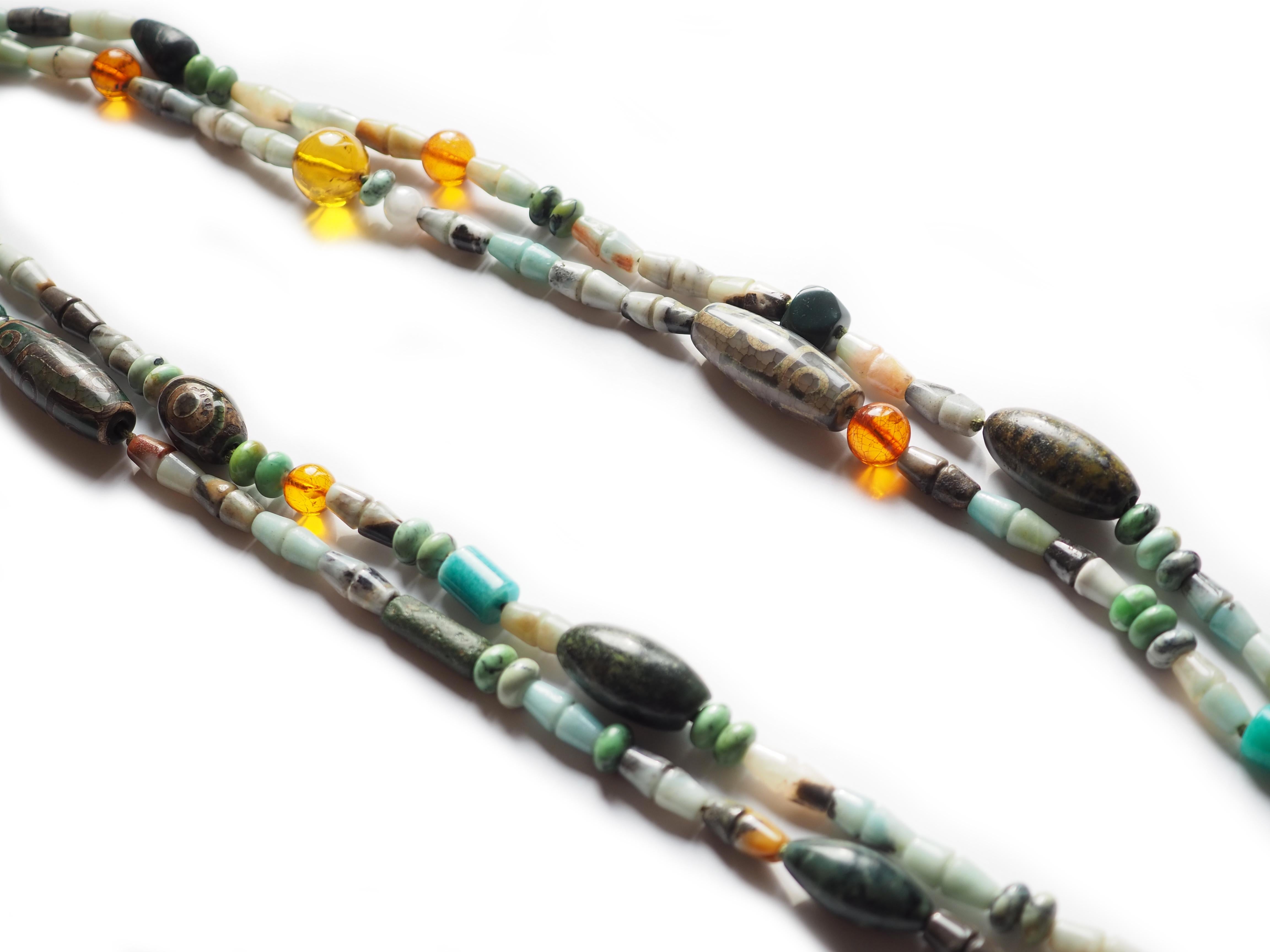 Amazonite Jasper Amber Dzi murrina style Long Double Long Necklace make with all antique pieces Africans and Tibetan, 84 cm long.
All Giulia Colussi jewelry is new and has never been previously owned or worn. Each item will arrive at your door