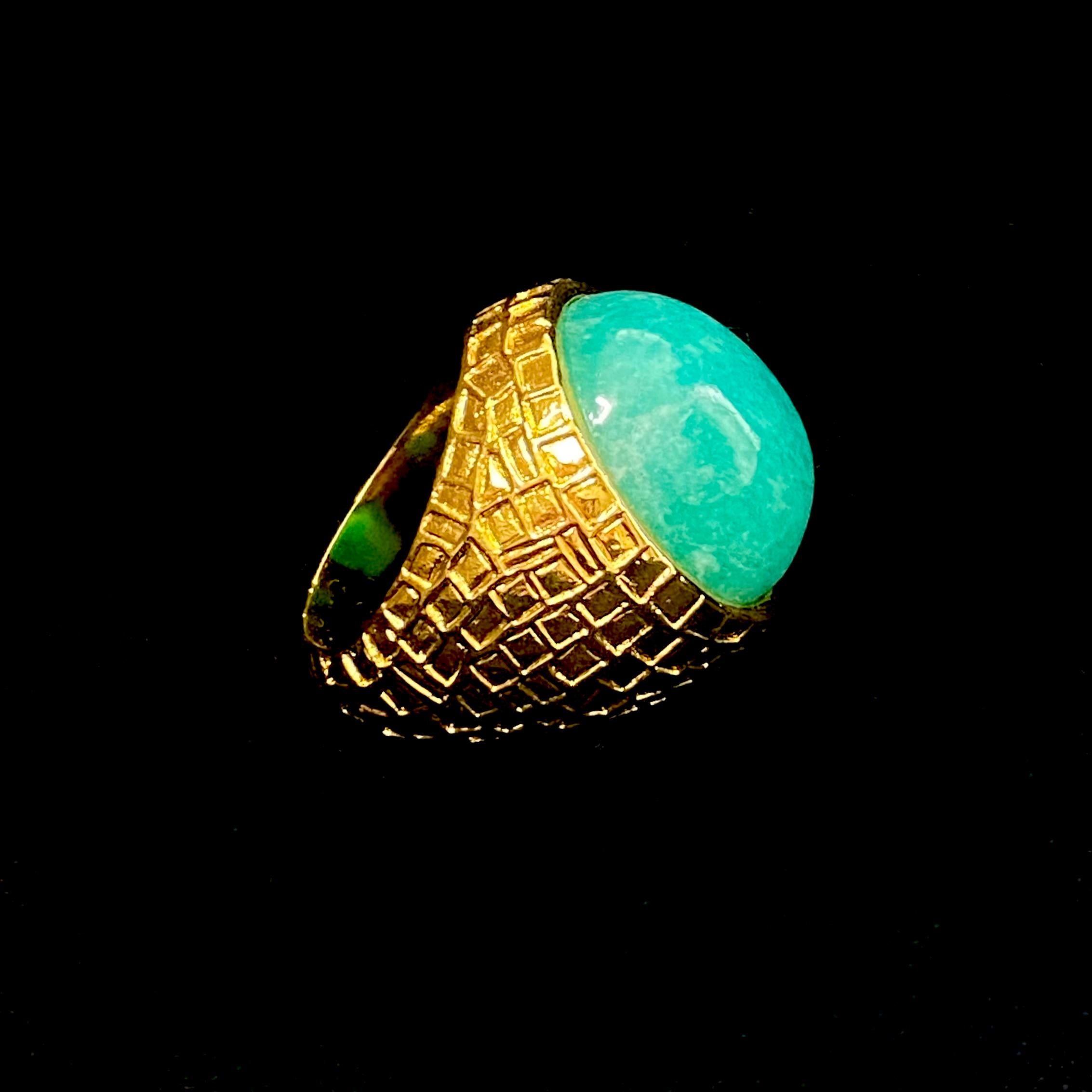 The beautifully vibrant oval cabochon Amazonite bezel set within a simple, yet striking Chiselled ring - perfect for day or night.

The Amazonite measures 20mm x 18mm; the ring stands 14.5mm 'proud' on the finger

This ring is a US size 7.5; while