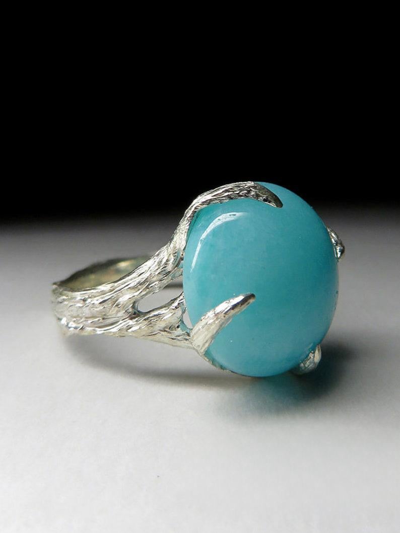 Silver ring with natural Amazonite 
gemstone origin - Brazil
gem size is 0.35 х 0.67 х 0.67 in / 9 х 17 х 17 mm
amazonite weight - 10.5 carats
ring weight - 6.13 grams
ring size - 7.75 US