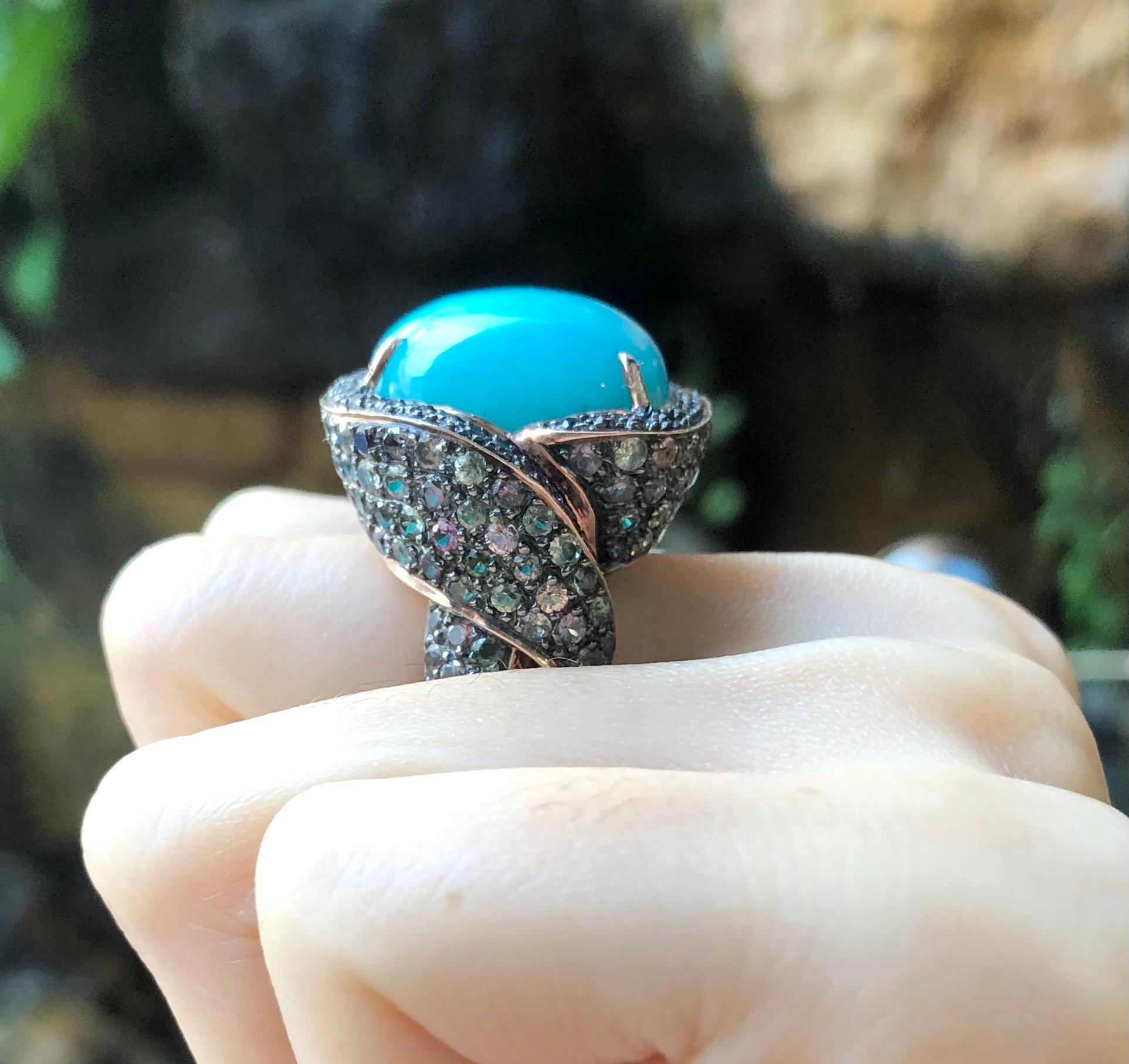 Amazonite with Rainbow Colour Sapphire 22.40 carats Ring set in Silver Settings

Width:  2.9 cm 
Length: 2.5 cm
Ring Size: 56
Total Weight: 17.31 grams

*Please note that the silver setting is plated with rhodium to promote shine and help prevent