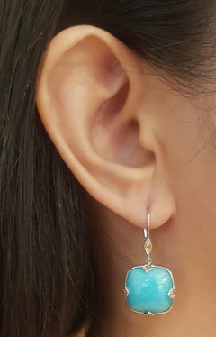 Orecchini con amazzonite e zaffiro giallo incastonati in oro bianco 18K