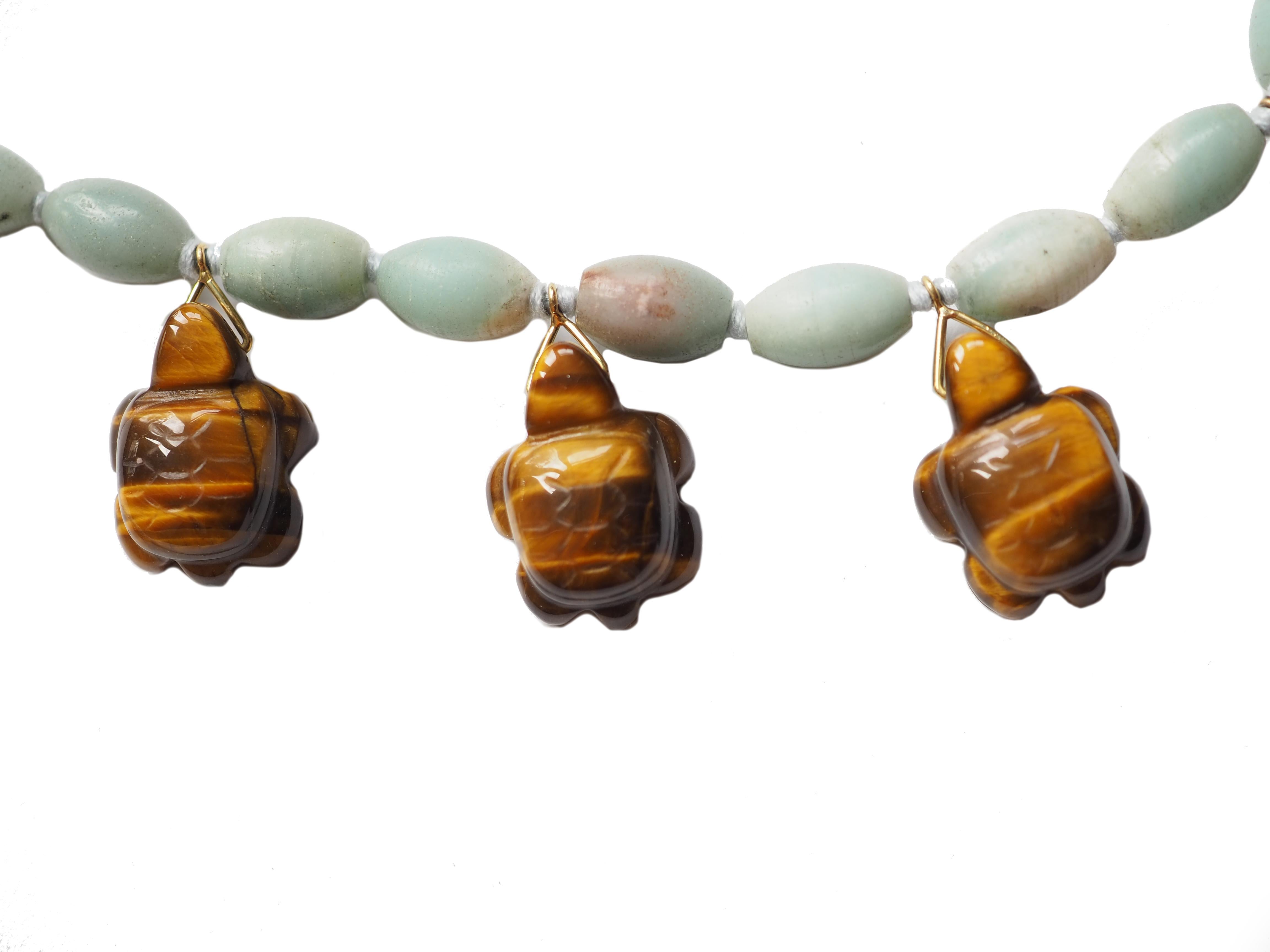 Amazzonite tiger's eye carved turtle Necklace 18 kt Gold gr 3,40 length 48 cm.
All Giulia Colussi jewelry is new and has never been previously owned or worn. Each item will arrive at your door beautifully gift wrapped in our boxes, put inside an