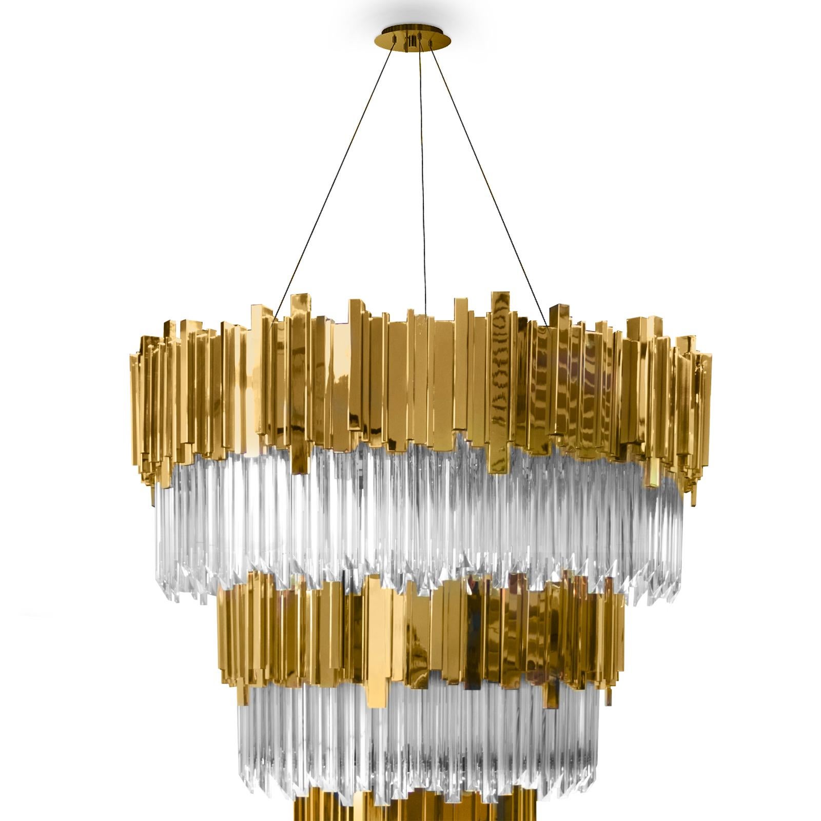 Chandelier Ambassador with crystal glass pendants.
With four circular rows of gold plated polished brass
rectangular sticks. With 75 bulbs, lamp holder type G9.
20 Watt max, for 220-240V. Bulbs not included.
With steel ropes for hanging: 200cm