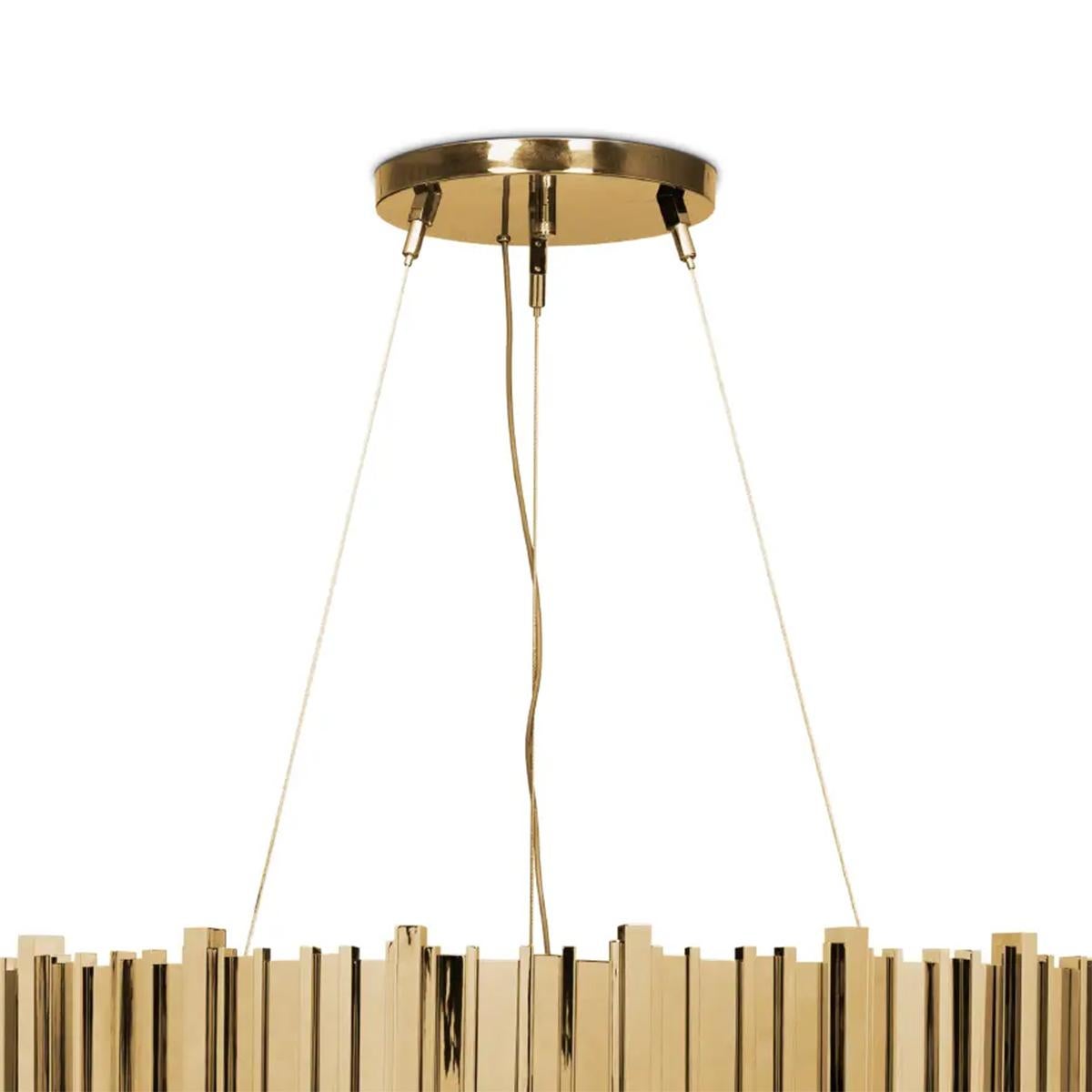 Chandelier Ambassador Medium with crystal glass pendants.
With 2 circular rows of gold plated polished brass rectangular 
sticks. With 24 Halogen bulbs, lamp holder type G9.
20 Watt max, for 220-240V. Bulbs not included.
With steel ropes for