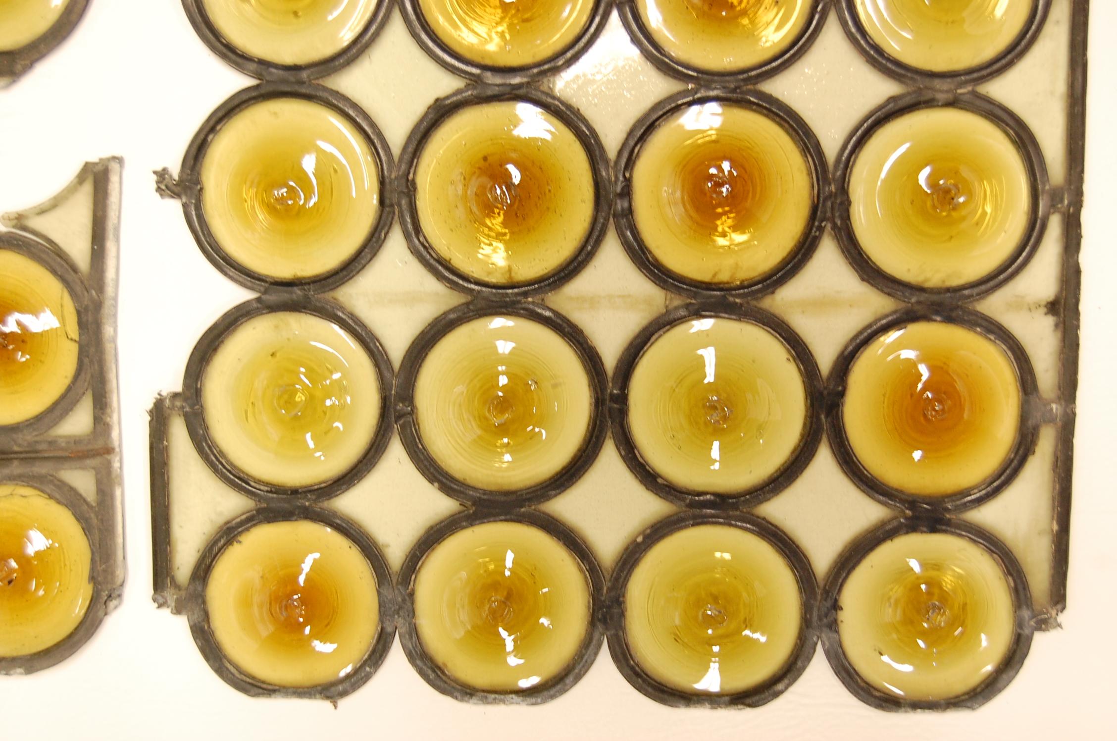 Fragments of amber from windows in original lead, app. 3
