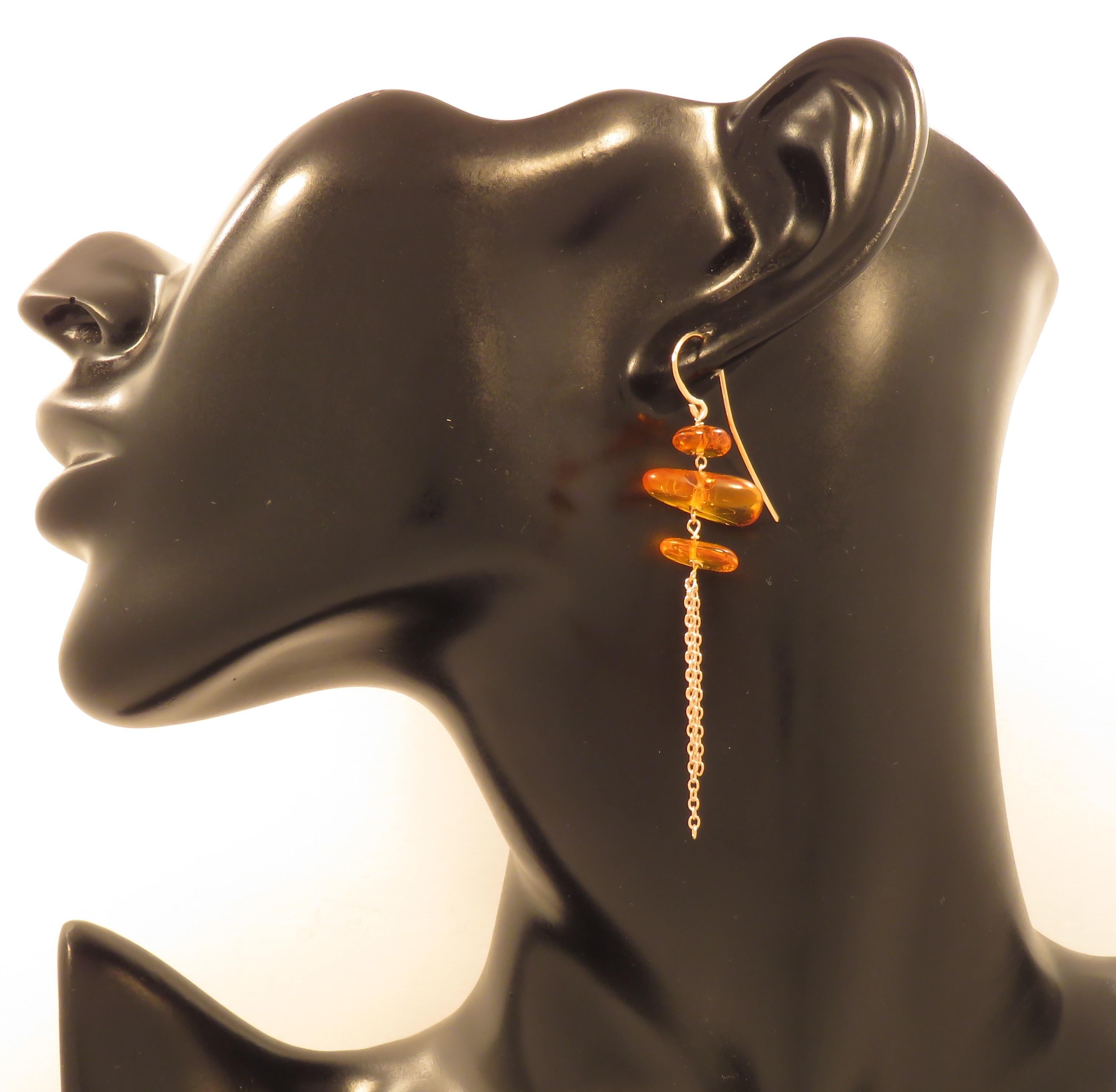 Lovely dangle earrings with 6 nugget cut amber gems and rolo chain handmade in 9 karat rose gold. The length of each earring is 60 mm / 2.362 inches. Marked with the Italian gold mark 375 and Botta Gioielli brandmark 716MI.
Search Ref: