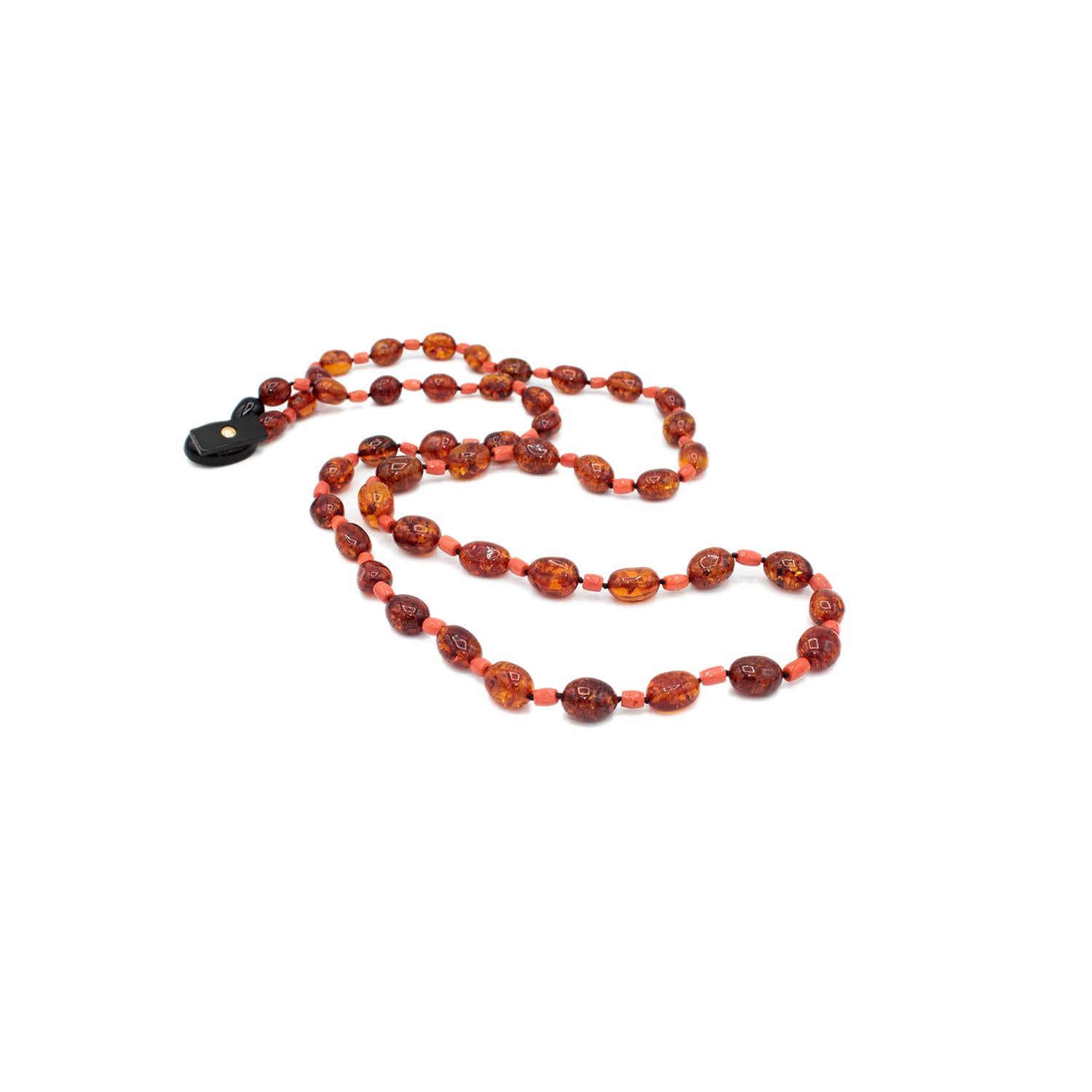 A necklace realized in Natural amber, red coral and bakelite clasp
Red Mediterranean Coral (Corallium rubrum)
Natural Baltic Amber
Bakelite clasp
Total lenght cm 100 ( including clasp) 
