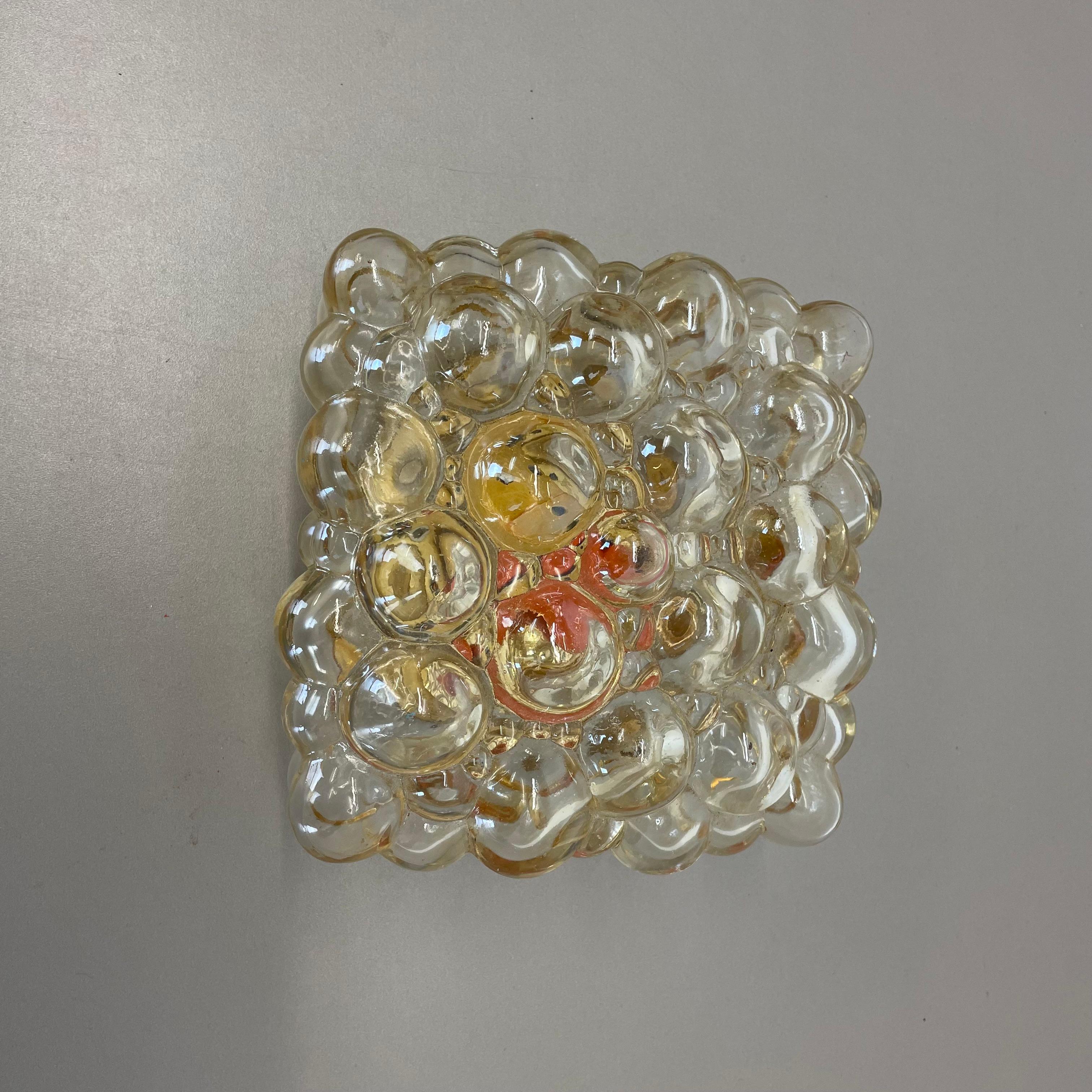 NOTICE: the red spot that is visible underneath the glass comes from a red bulb, that was screwed into the socket.


Article:

wall light



Producer: 

Glashütte Limburg, Germany


Design:

Helena Tynell


Origin: 

Germany


Age: 

1960s





This