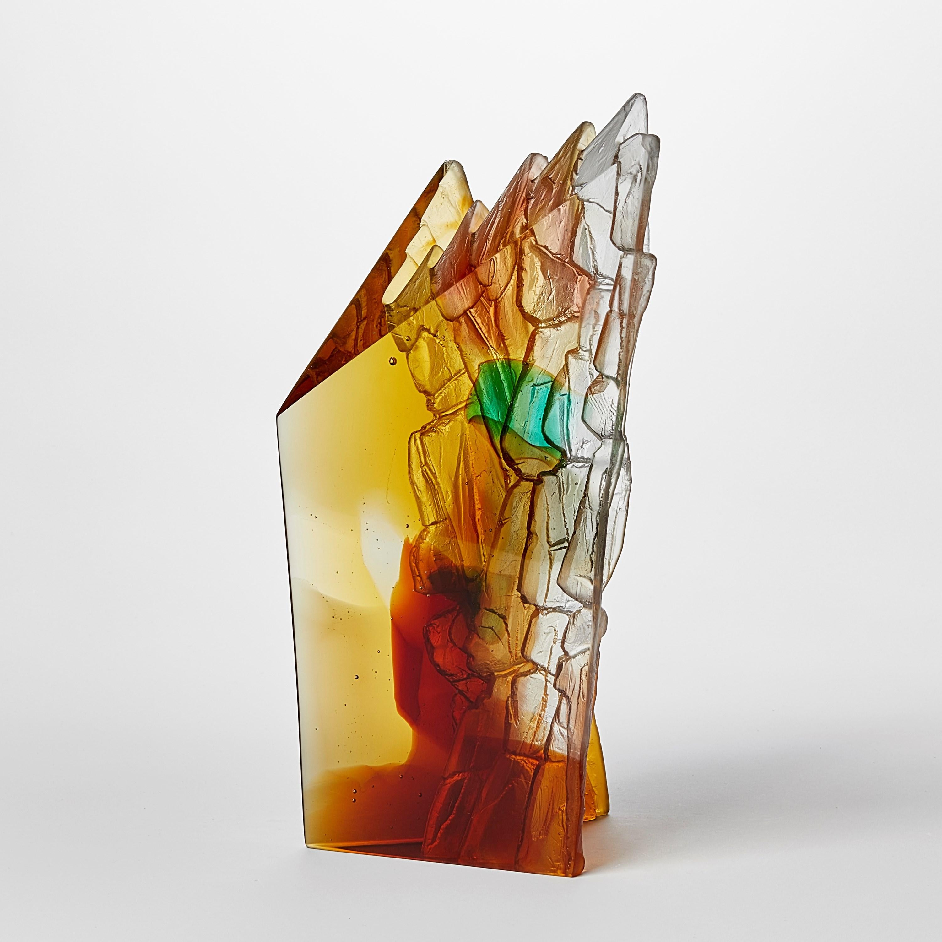 'Amber Cliff' is a unique cast glass sculpture by the British artist, Crispian Heath.

Crispian Heath's work is predominantly inspired by landscape and his love for exploring the rugged cliffs and other geological sites which are unique to Britain.