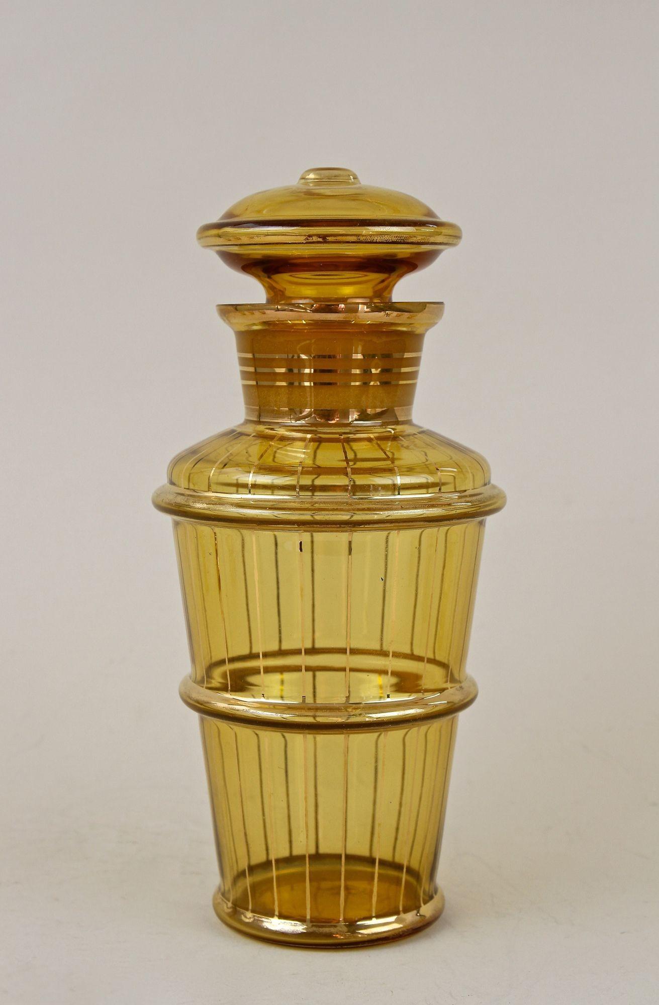 Czech Amber Colored Gilt Art Deco Glass Decanter Set with 6 Shot Glasses, CZ ca. 1920 For Sale