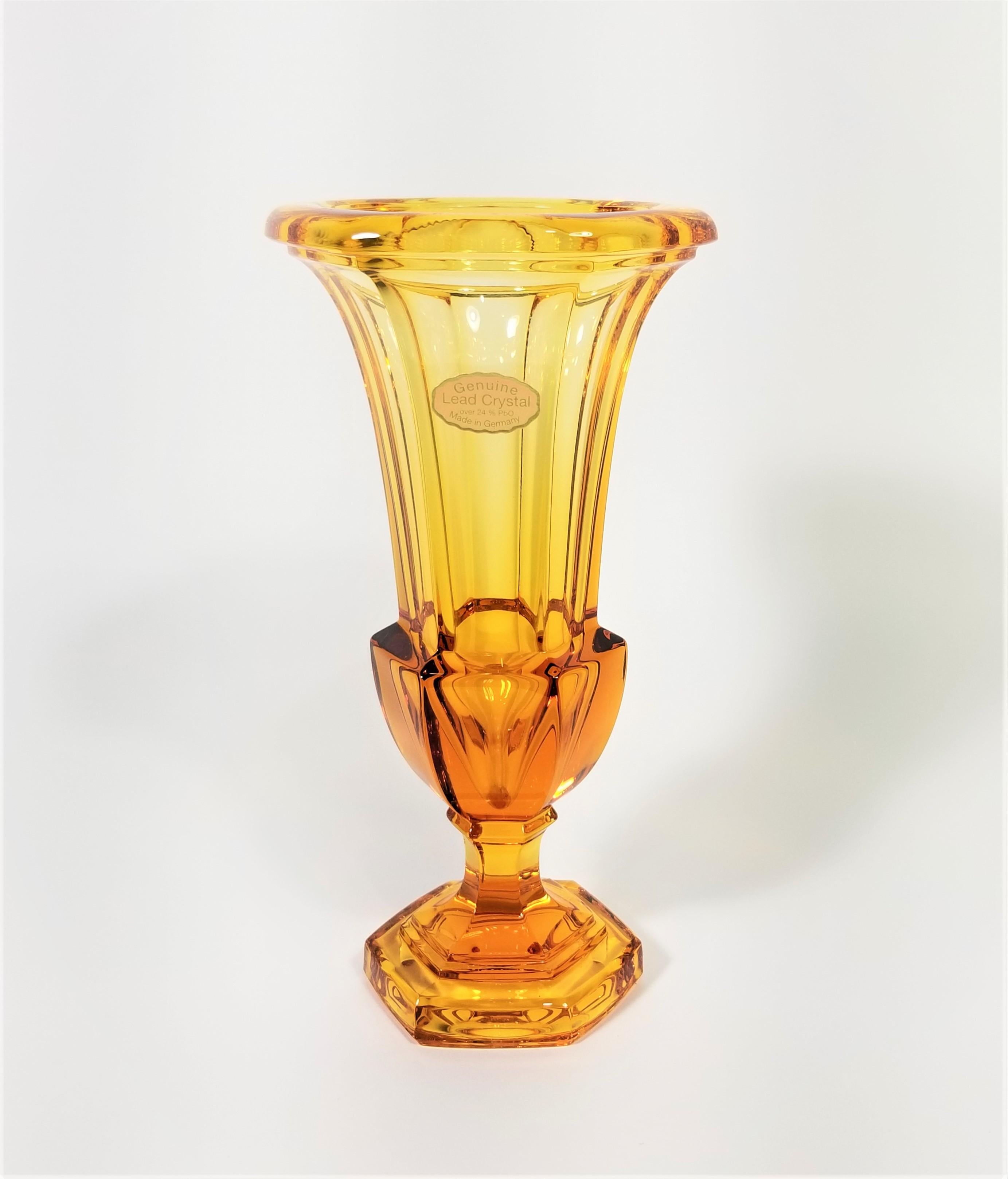 Gorgeous midcentury lead crystal vase. Beautiful amber color, 1950s-1960s. Still retains original marking sticker. Made in Germany. Excellent condition.