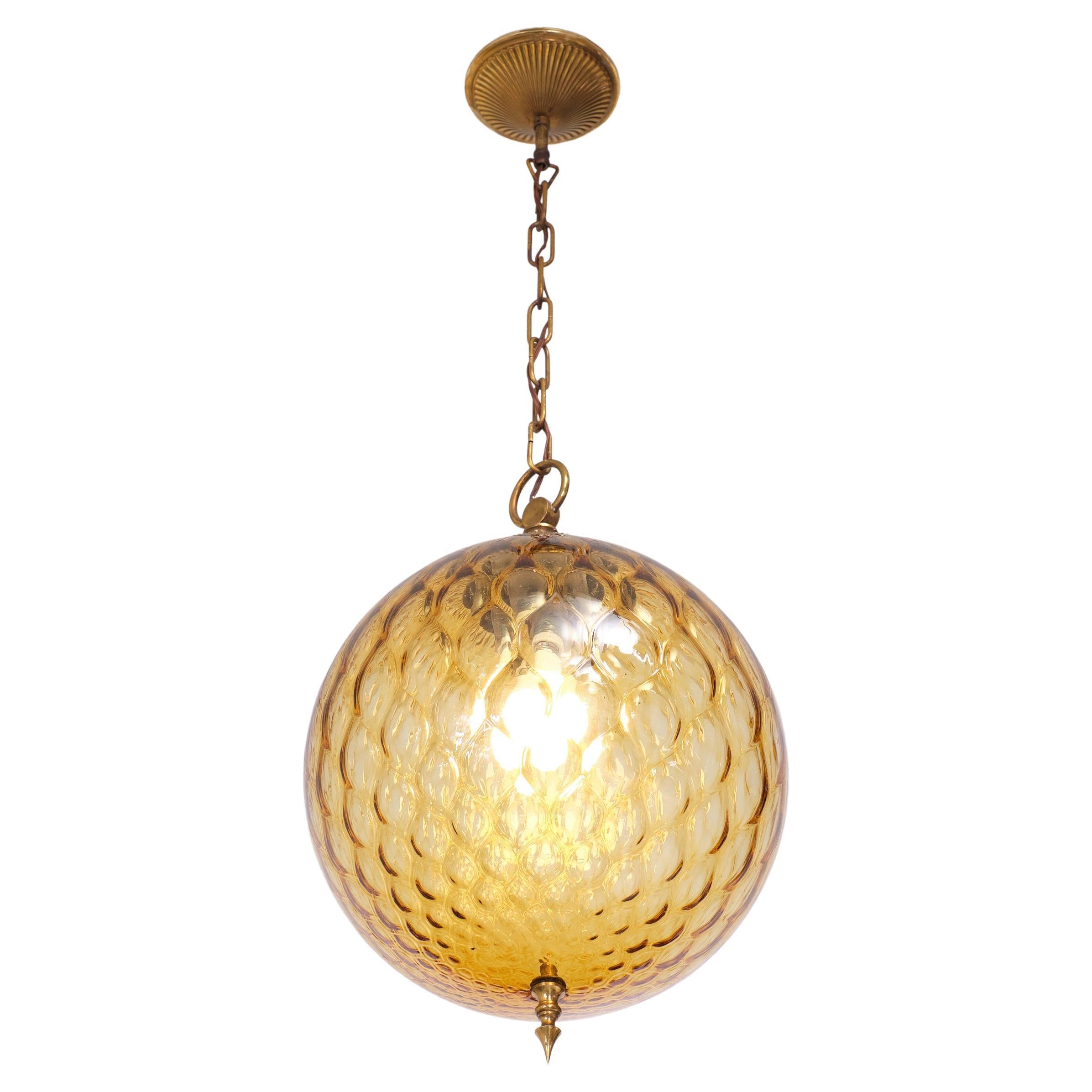 Love this Empoli Murano Amber color Boll ceiling lamp . Very nice Brass armature . 
one large E27 bulb needed . 1960s Italy, adjustable in height .

Please don't hesitate to reach out for alternative shipping quote