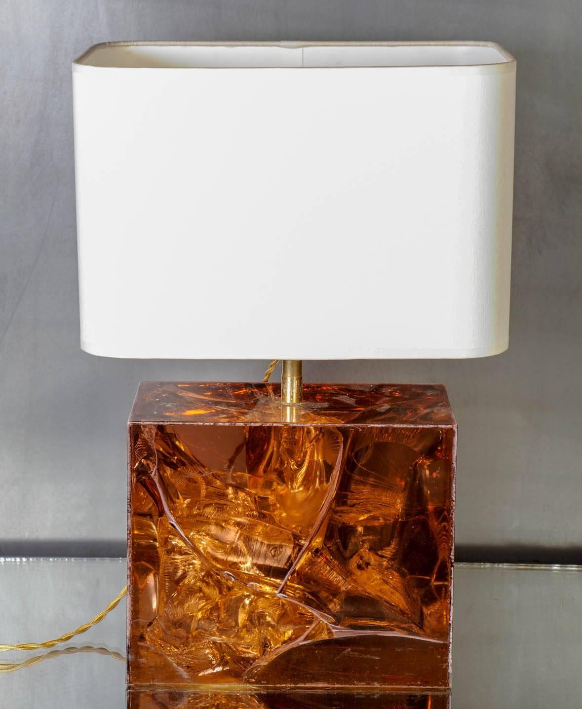 Nice brick shaped table lamp made of a resin fractal block in an amber and earthy tones and new brass neck.

Original sticker from the manufacturer under the lamps: 
