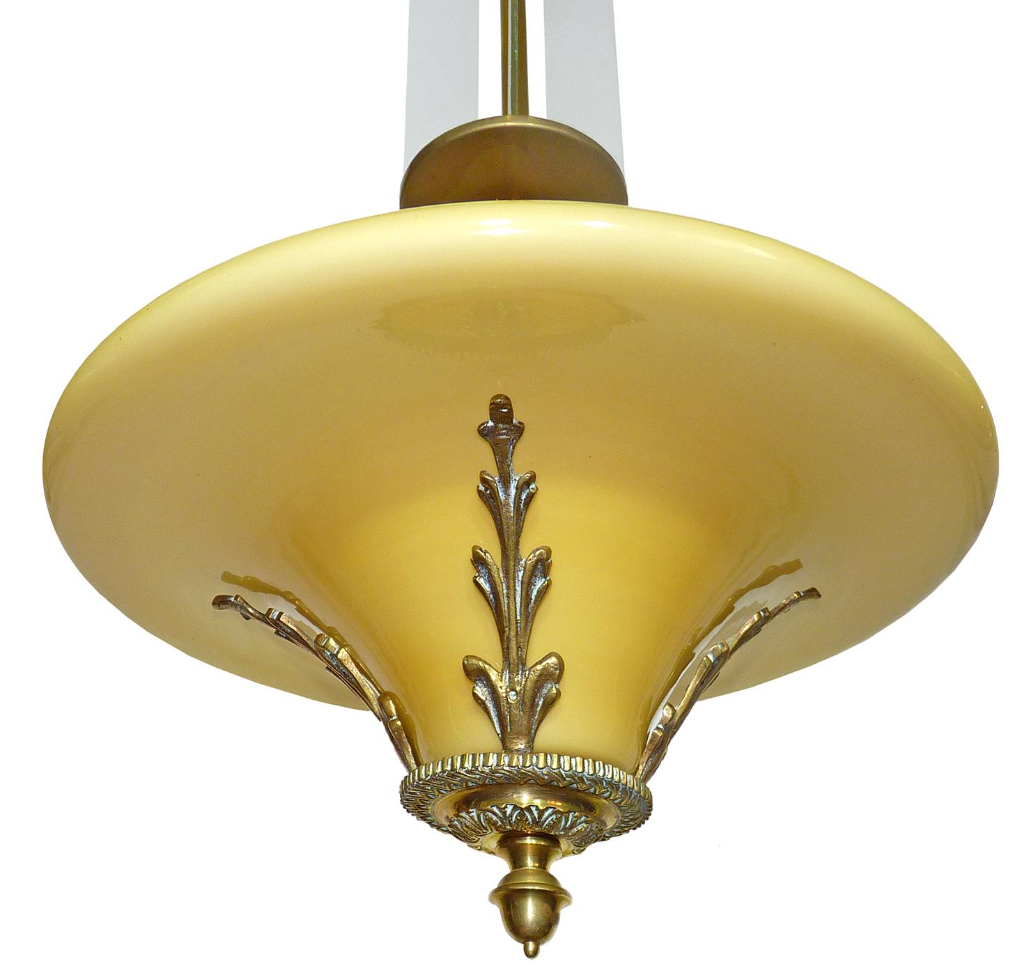 Antique Yellow French Art Deco or Art Nouveau bronze and opaline glass hanging chandelier in the style of petitot with four frosted glass strips.
Beautiful age patina
Measures:
Diameter 15 in / 36 cm
Height 36 in / 90 cm
Weight 7 lb. (3