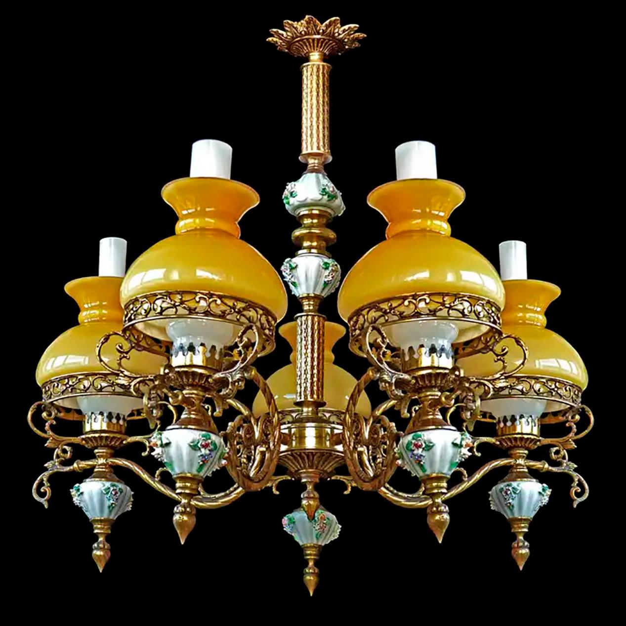 Gorgeous antique circa 1920 French Victorian Limoges porcelain five-light bulbs chandelier/bronze and opaline amber glass shades
Porcelain/opaline amber cased glass/chiseled gilt bronze/ brass
Five-light bulbs e 14 /good working condition
Diameter