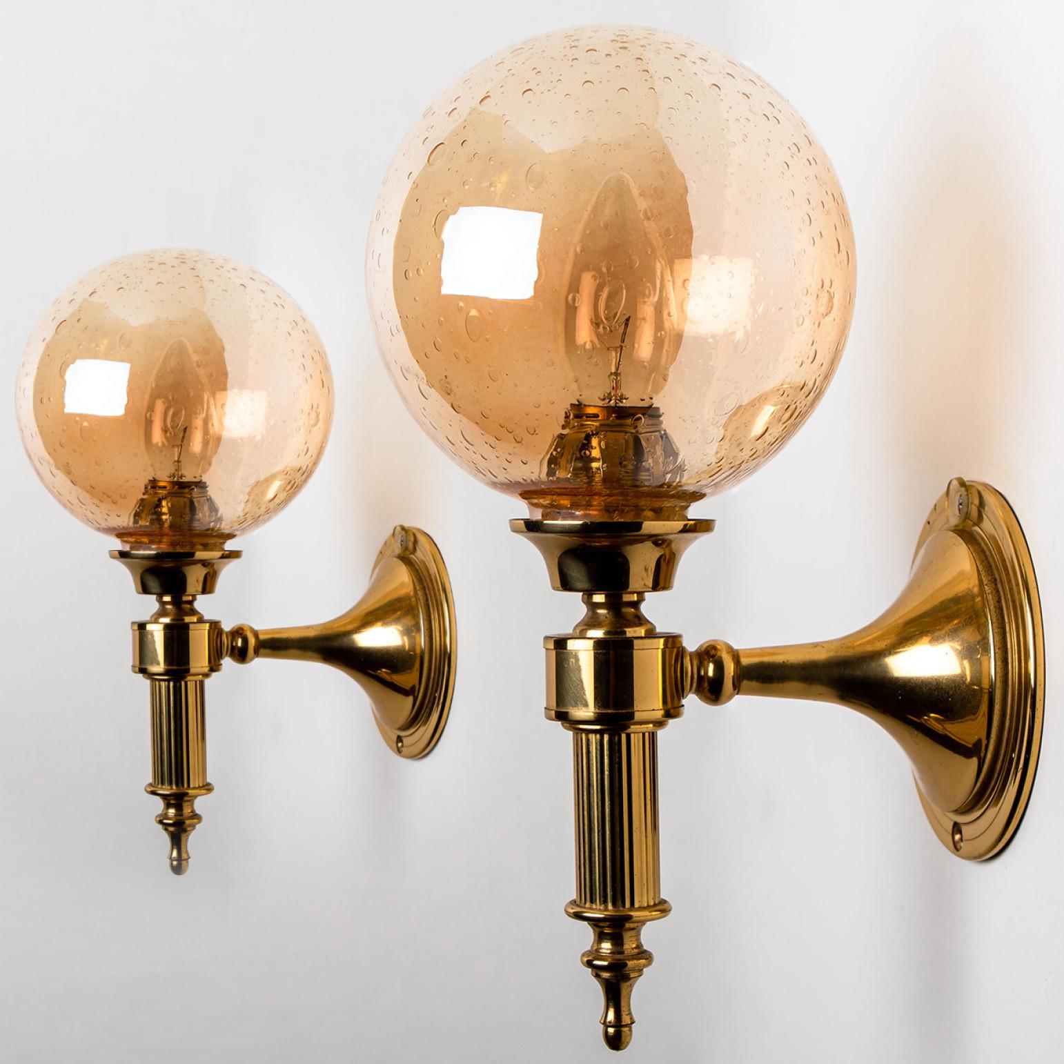 Mid-Century Modern Amber Glass and Brass Wall Lamps in the Style of Glashütte Limburg, 1975 For Sale