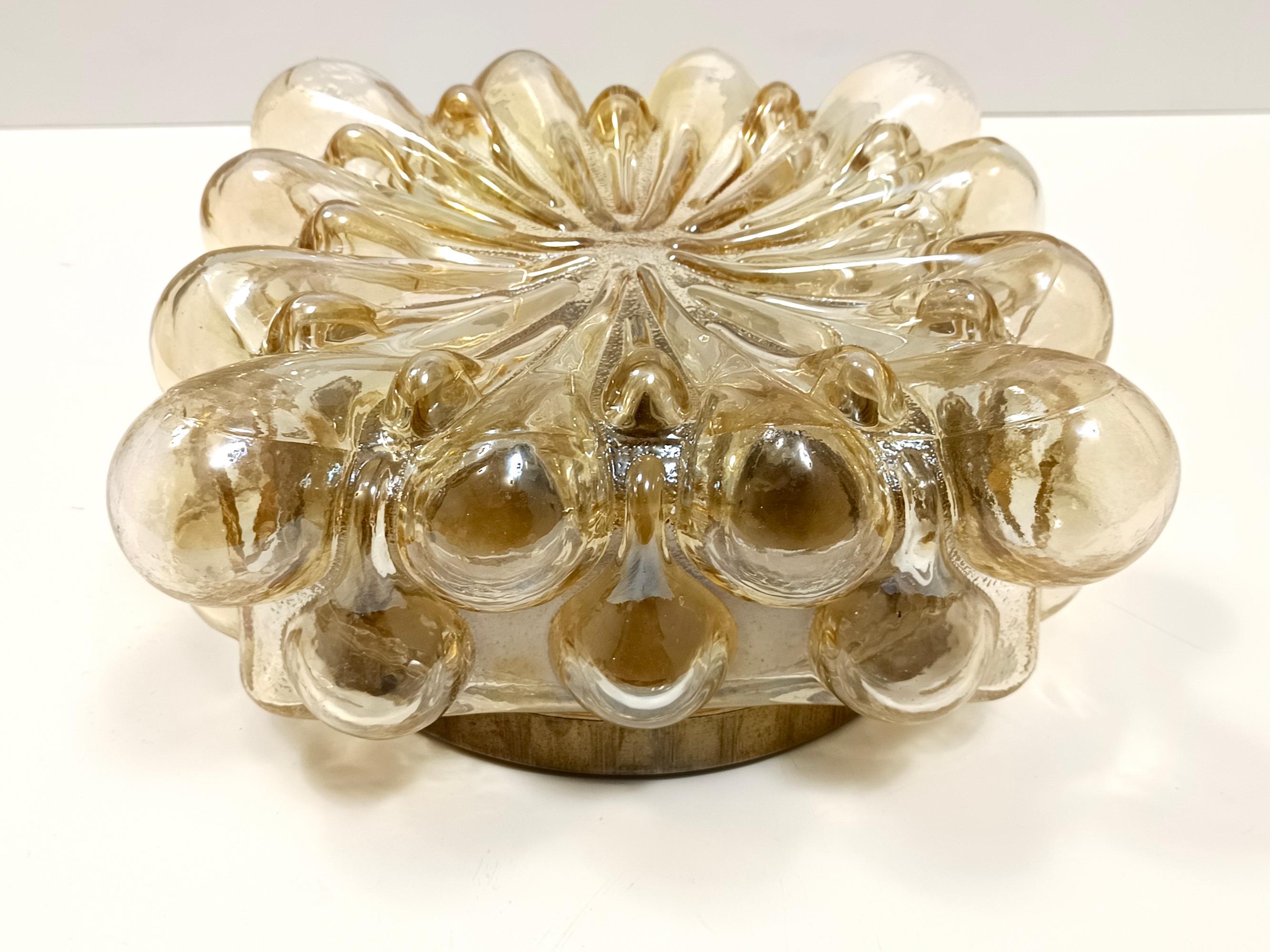 Late 20th Century Amber Glass and Gold Varnished Metal Ceiling Light by Helena Tynell For Sale