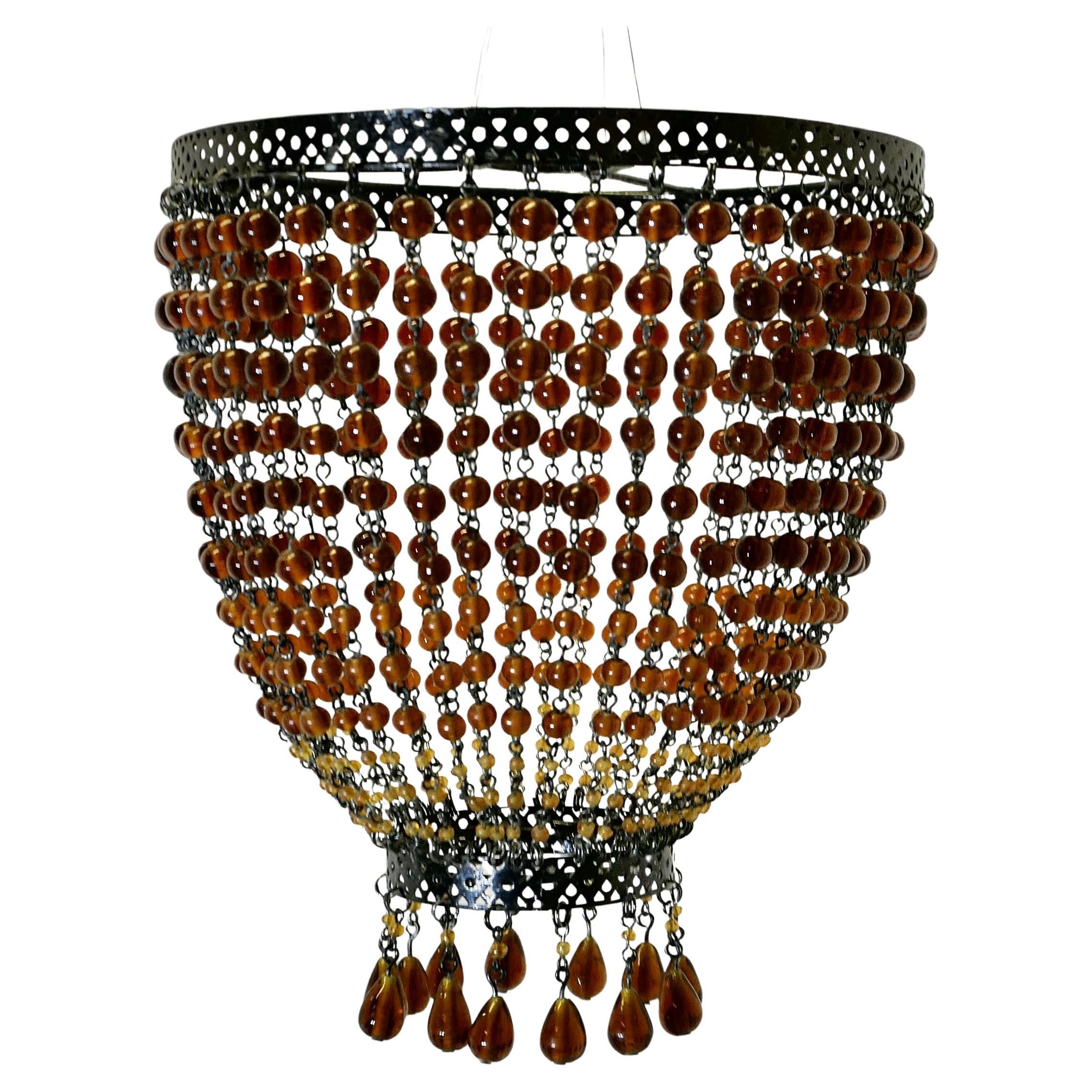 Abat-jour en verre ambré, lustre   Une pièce délicieuse
