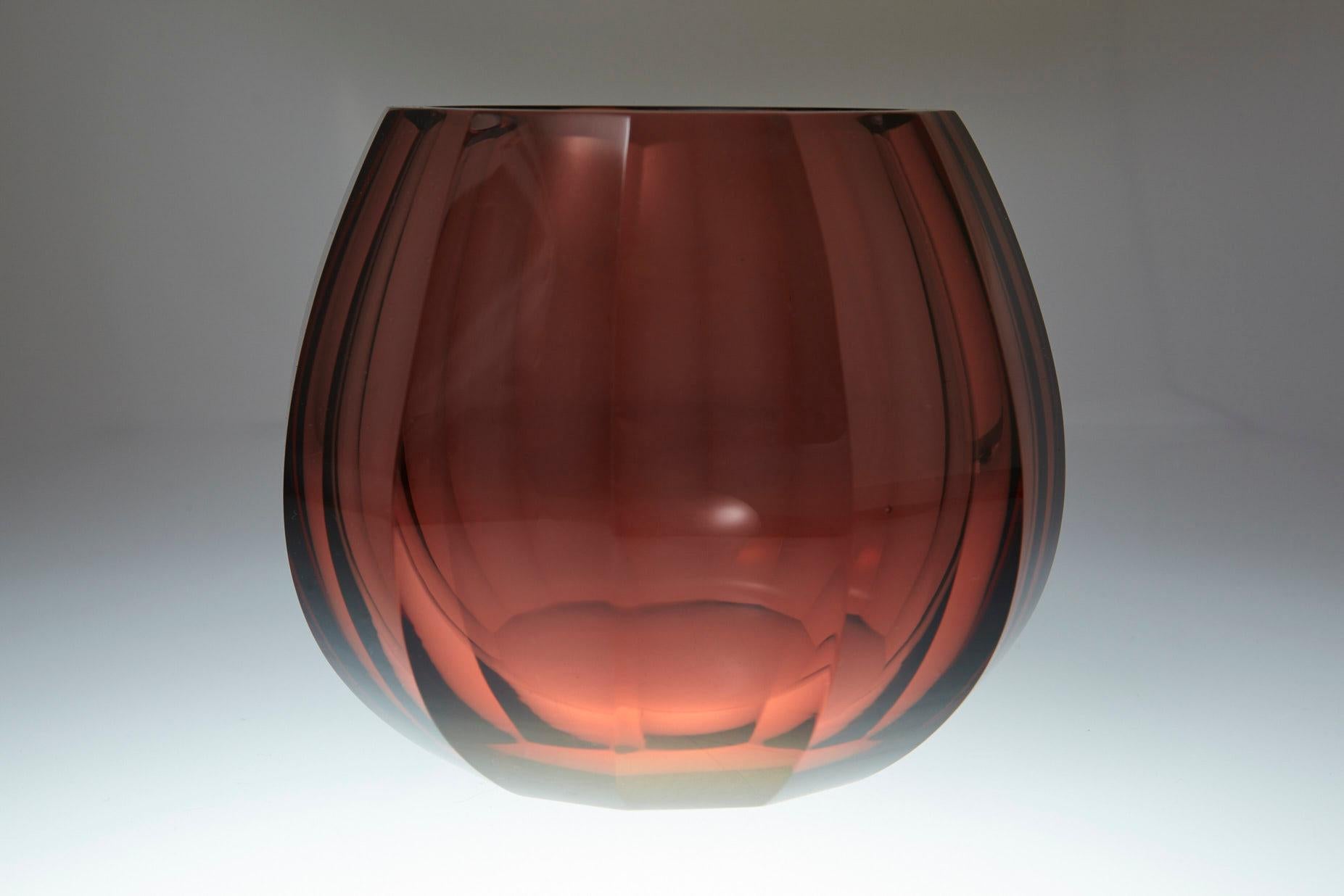 Amber hand-cut and hand-polished crystal vase. The piece is firmly attributed to Josef Hoffmann for 
Moser & Söhne, and signed Moser, circa the 1920s. 
The vase is in very good condition, no chips or fleabites on the cut edges, no repairs, one