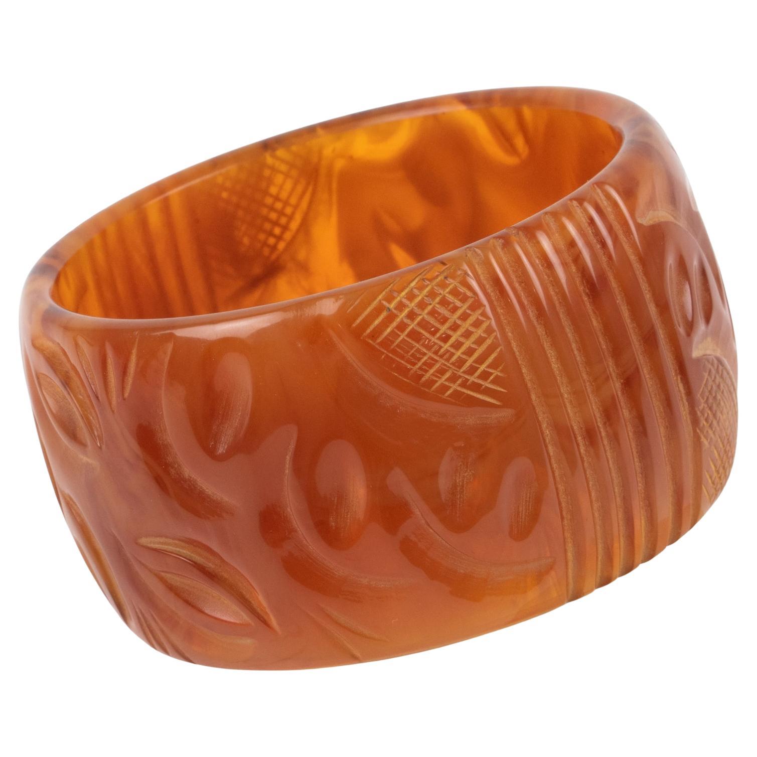 Milky Amber Bakelite Bracelet Bangle with Carving For Sale